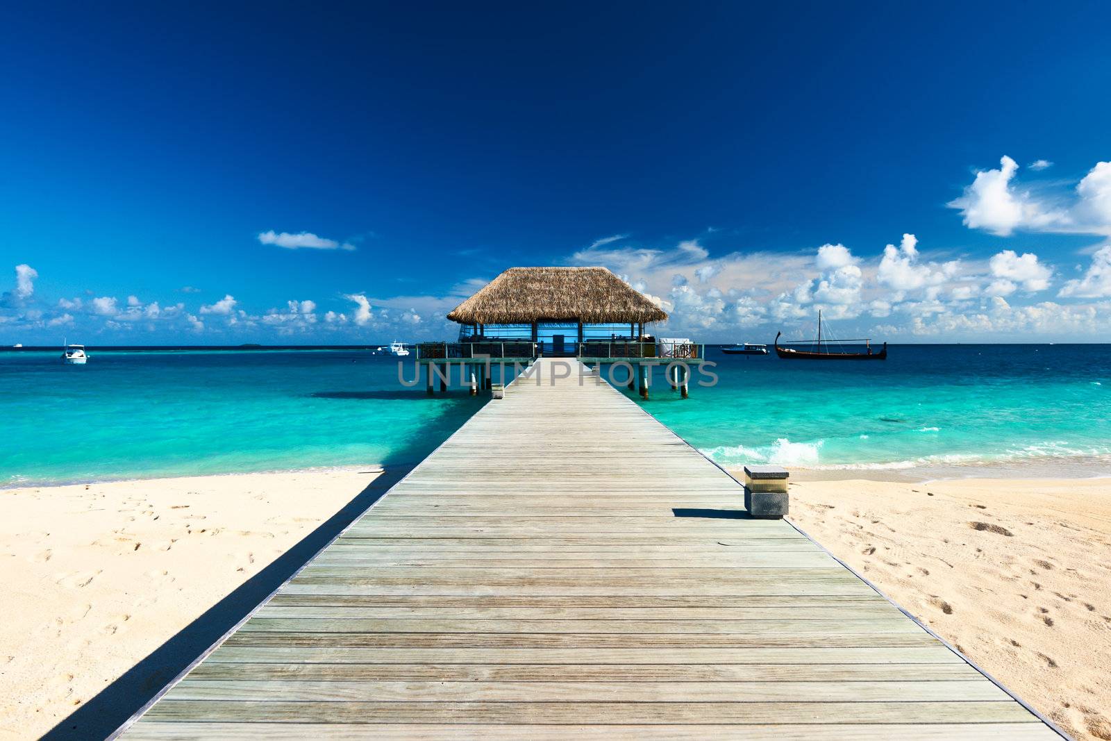 Beautiful beach with jetty at Maldives