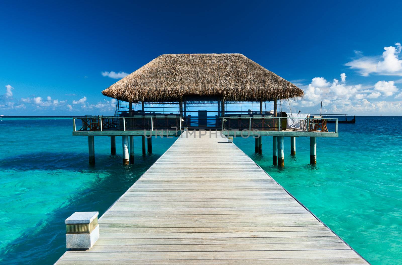 Beautiful beach with jetty at Maldives