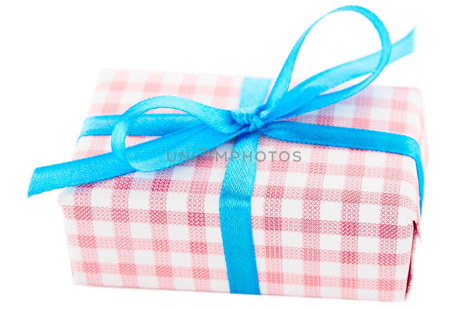Vintage gift box with blue ribbon, isolated on white background