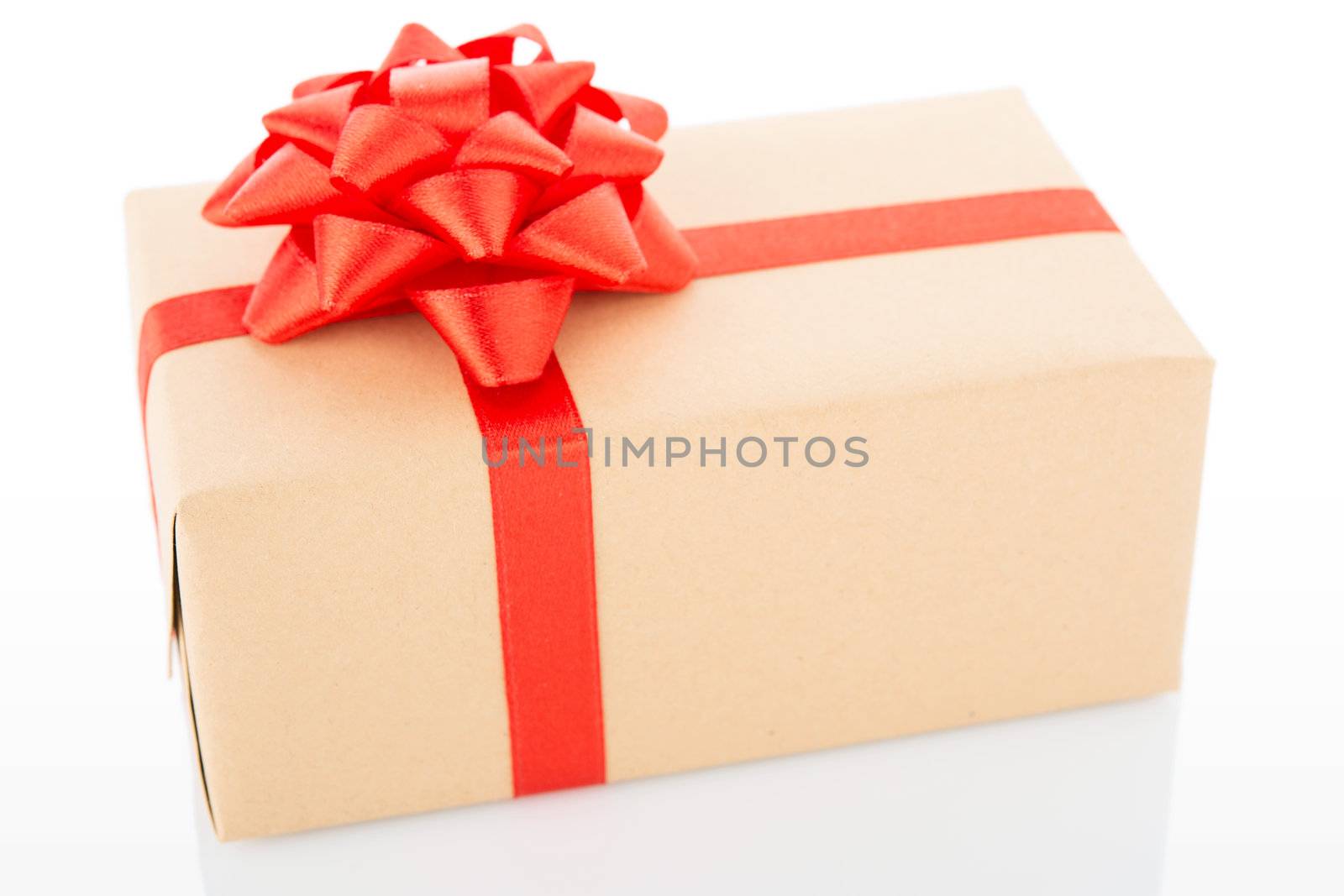 Vintage gift box with red bow, isolated on white background