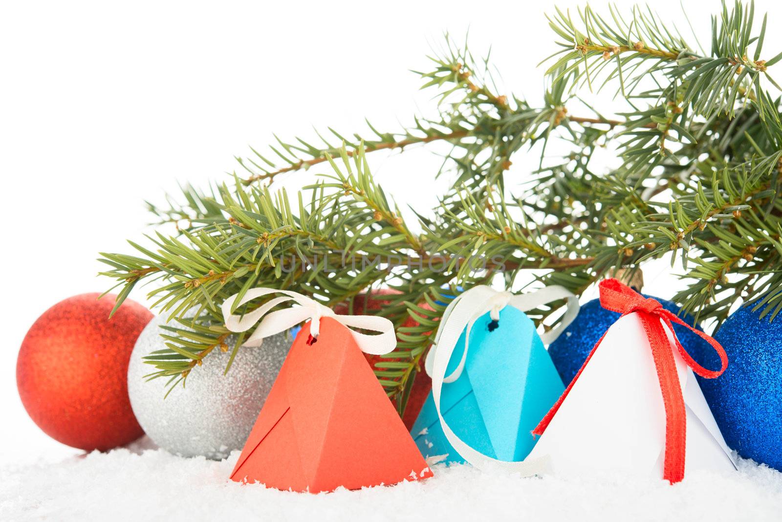Christmas tree and decorations on a snow.