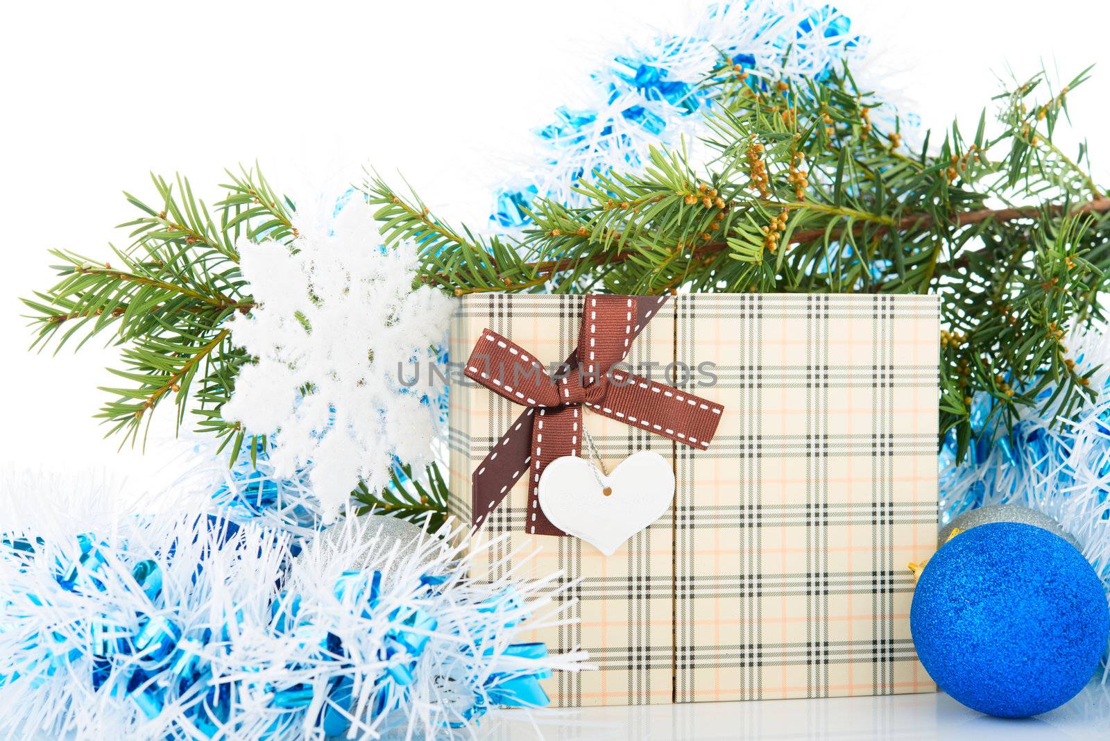 Christmas tree and decorations on white background.