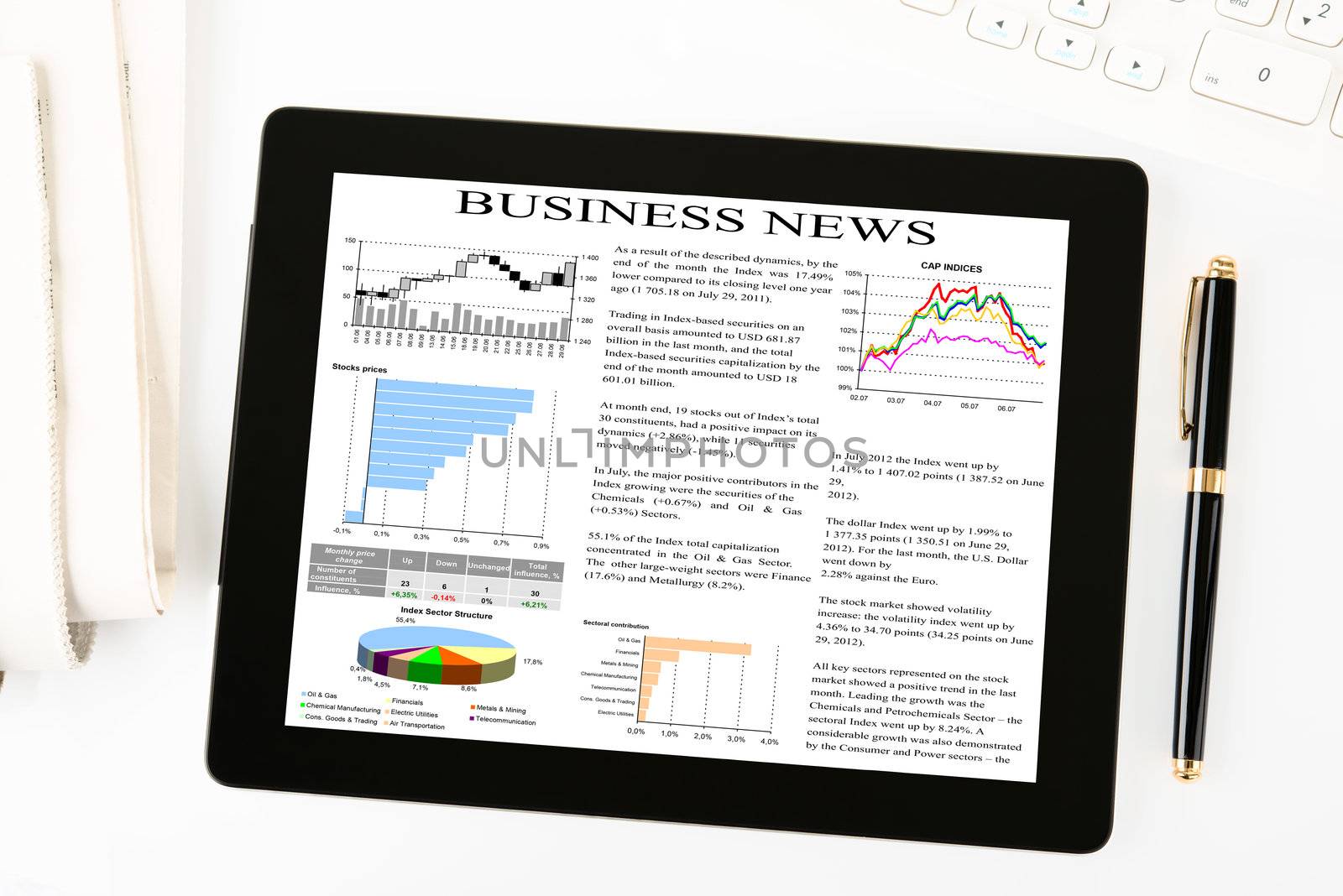 digital tablet with business news on screen