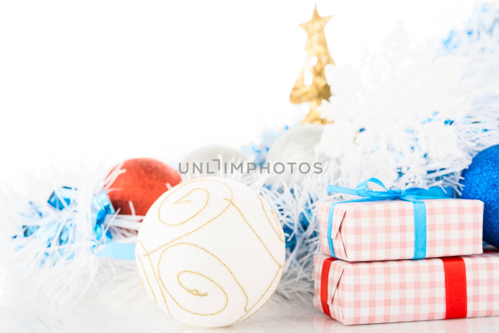 Christmas decorations and gifts on white background.