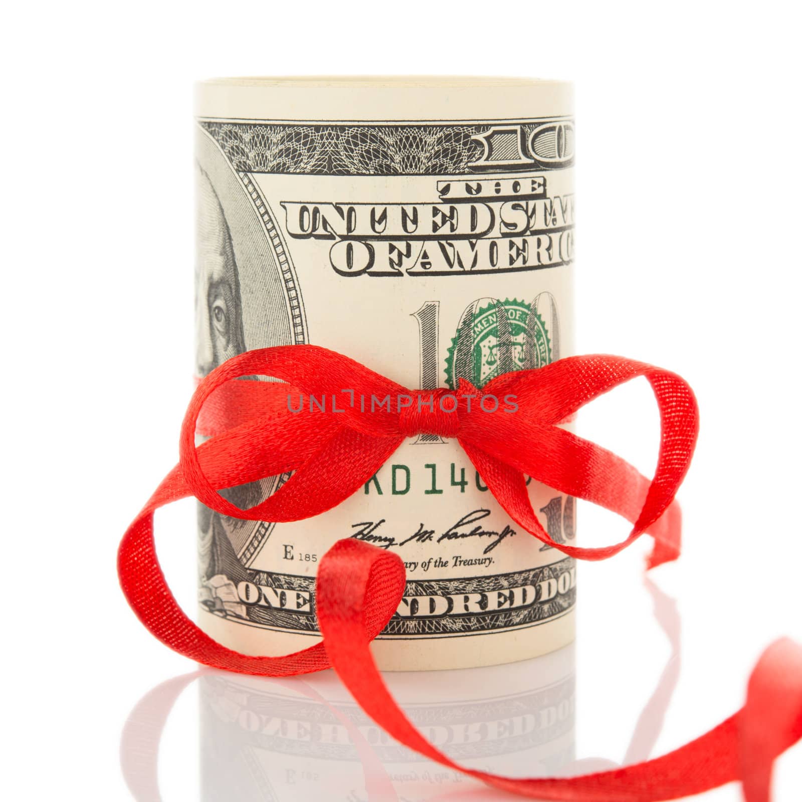 Money with ribbon and red bow