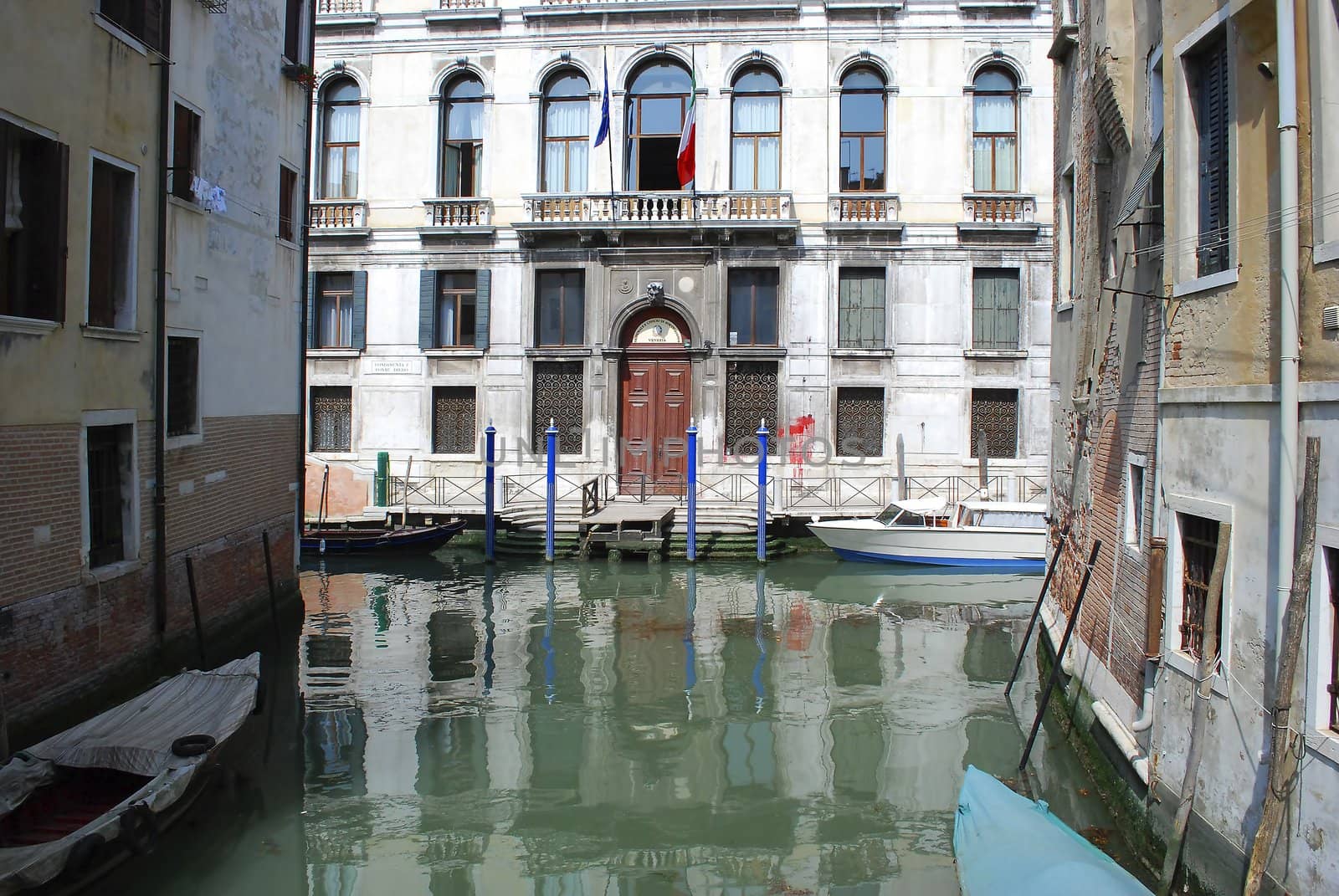 Venice canal with old house and color