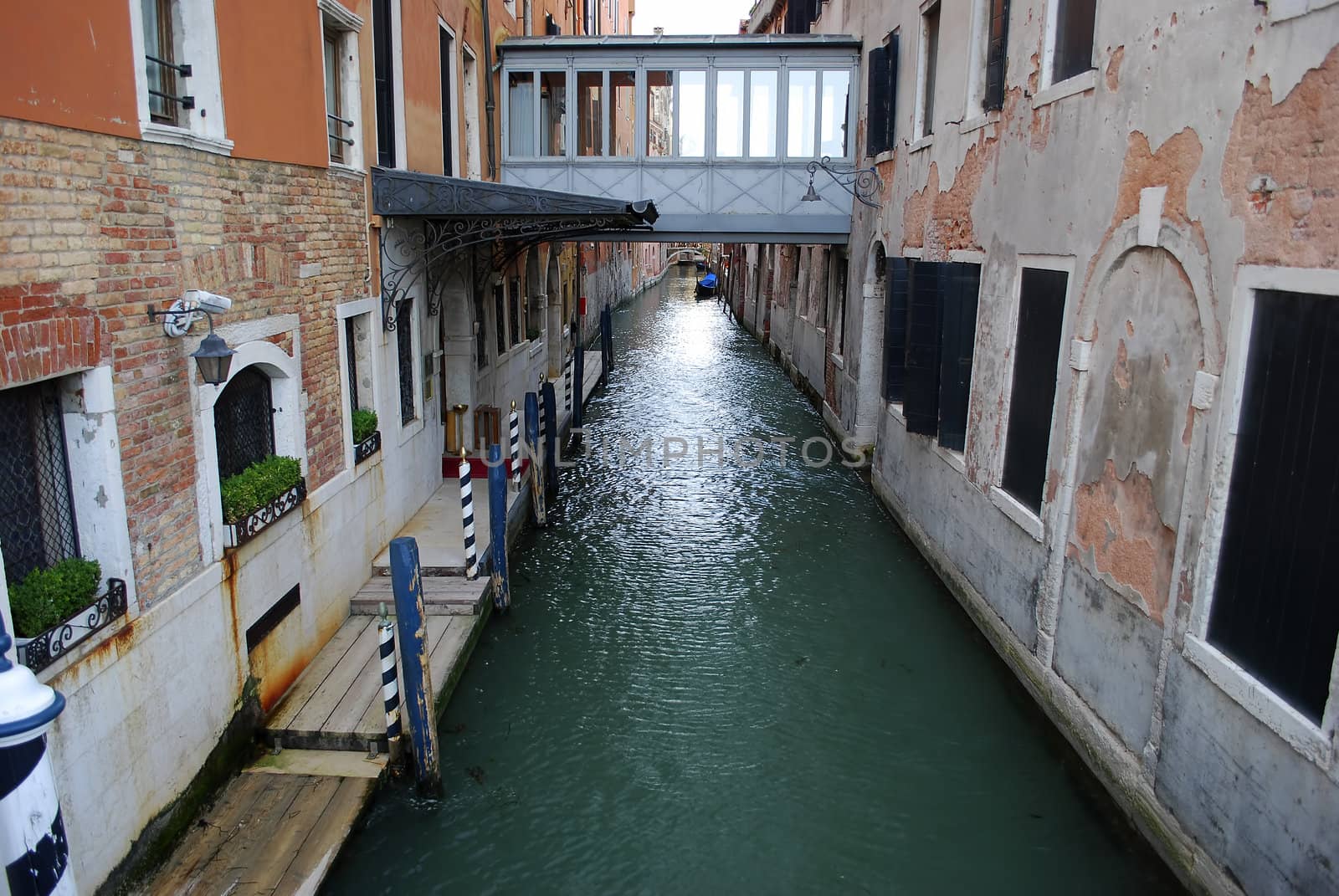 Venice canal with old house and color