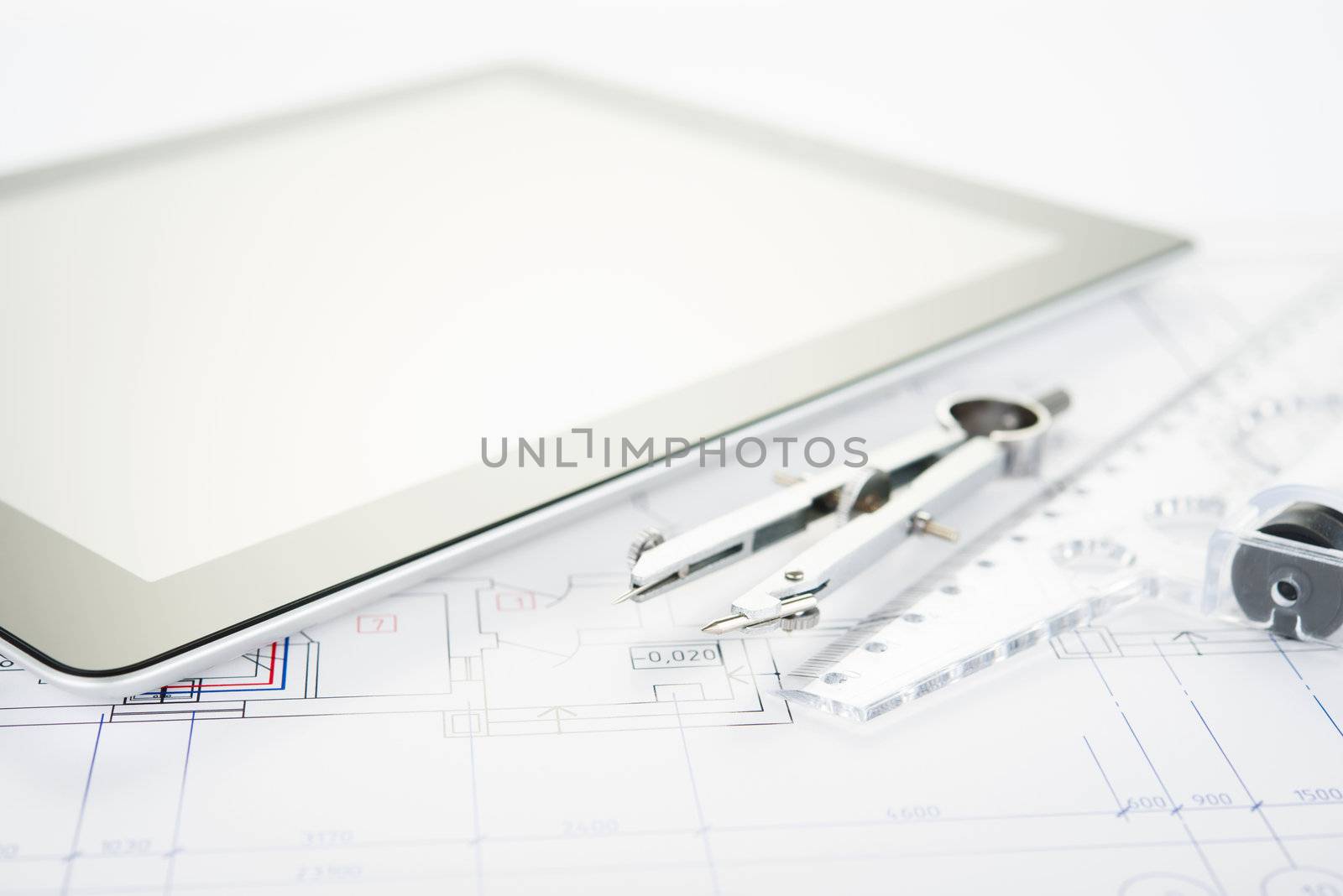 Architect workplace. Tools and tablet computer