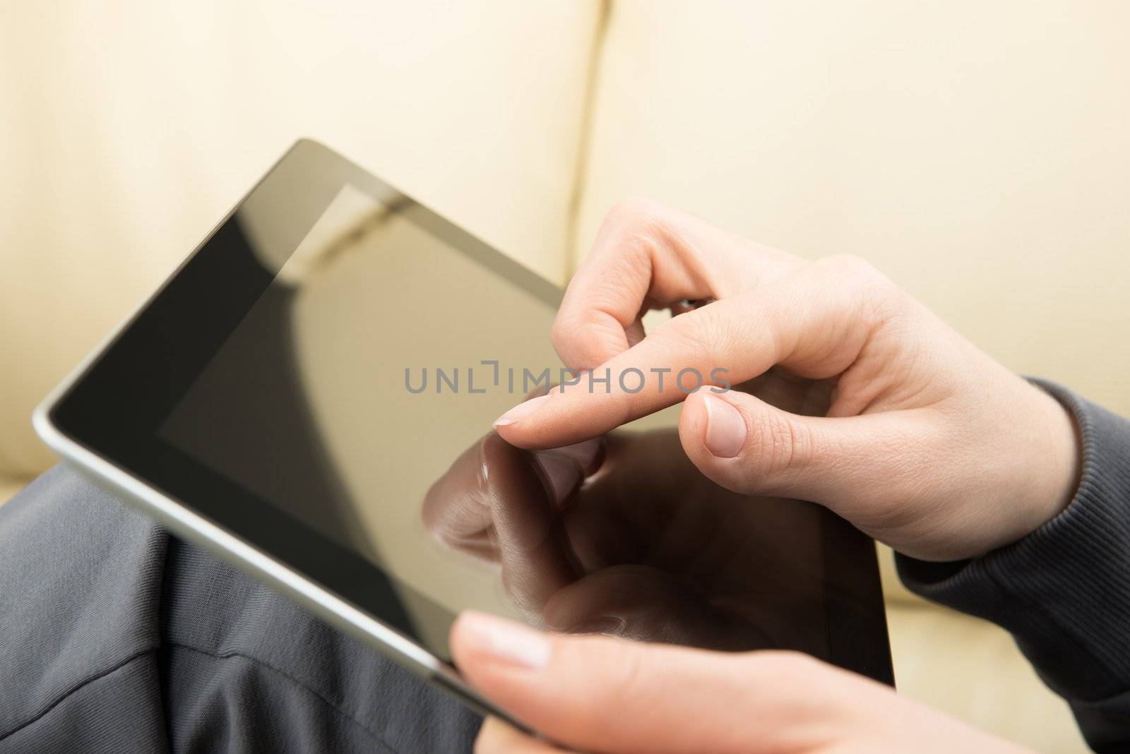 Woman hands with tablet computer