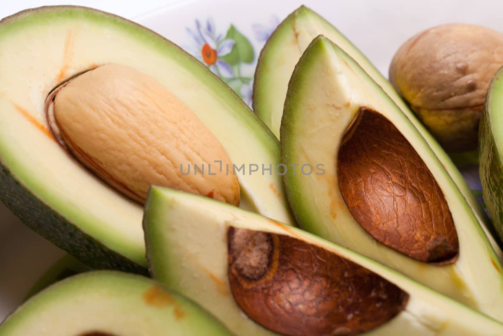 Fresh Avocado Halves On Plate