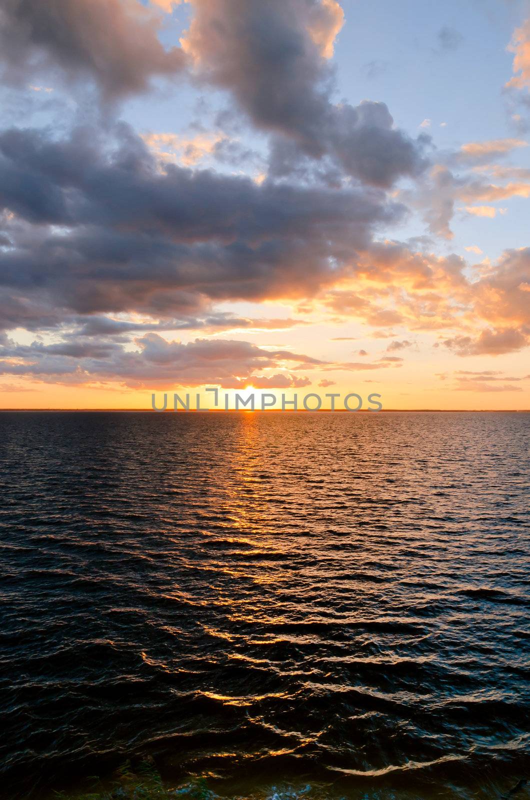 beautiful sunset over lake by Sergieiev