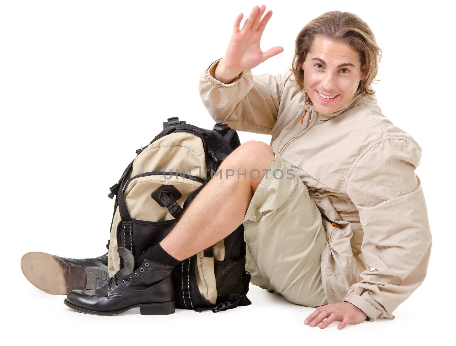 young man - tourist with backpack on a white background