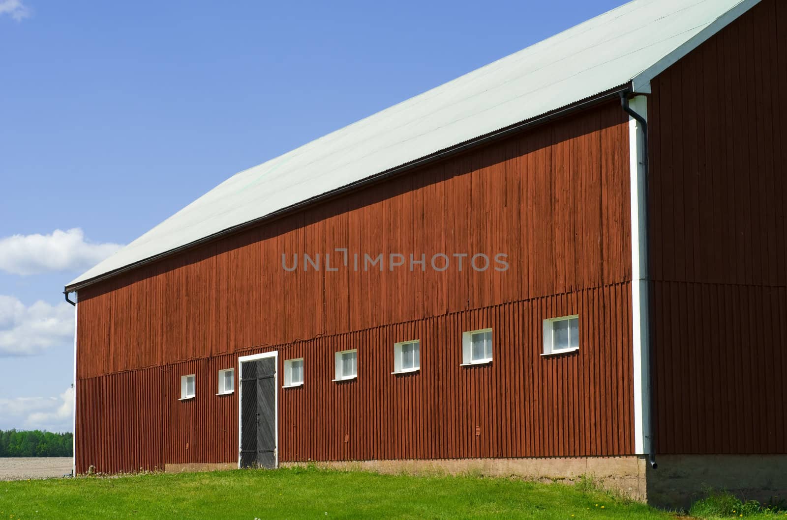 Red barn and blue sky