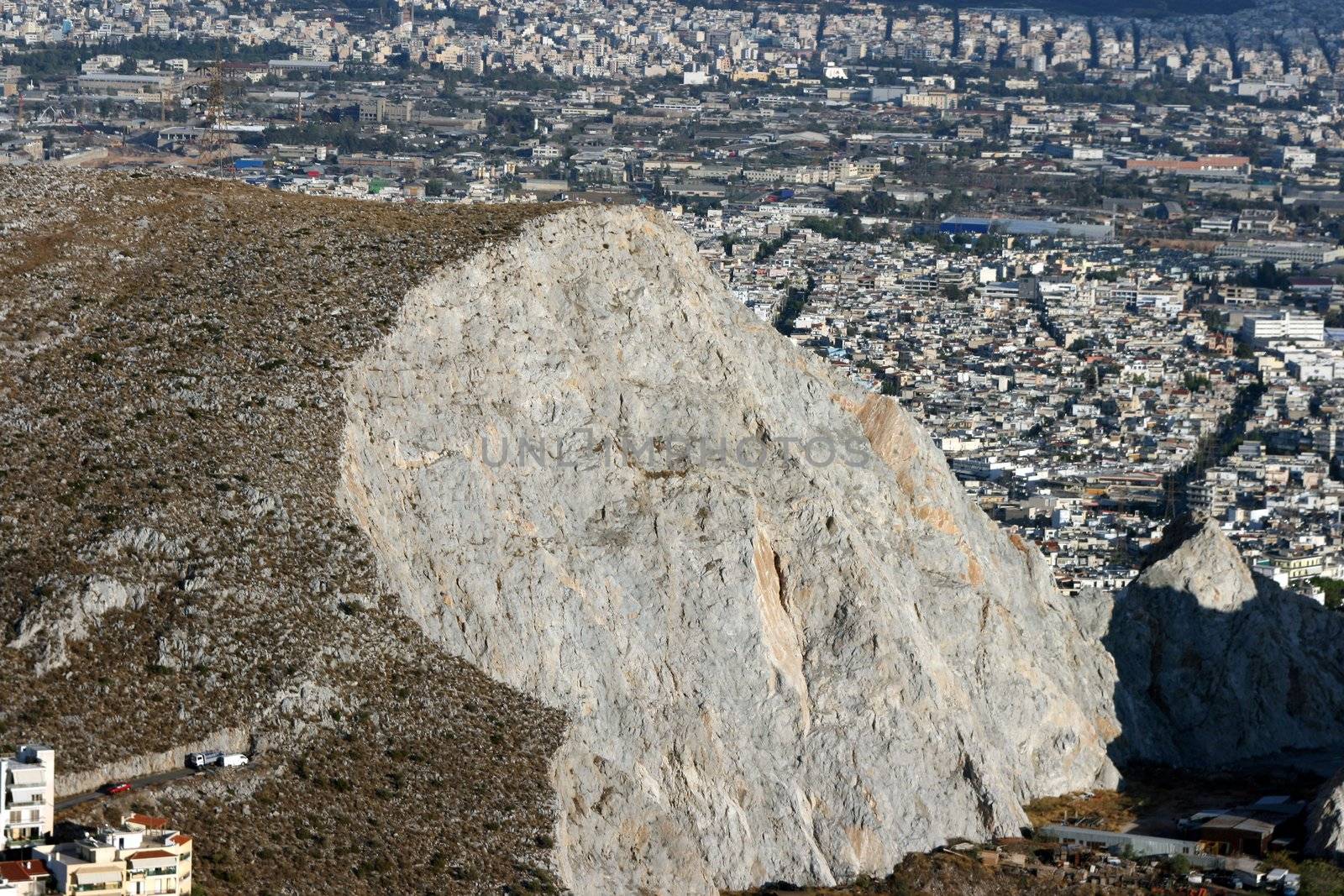 mountain cut with city background in athens greece