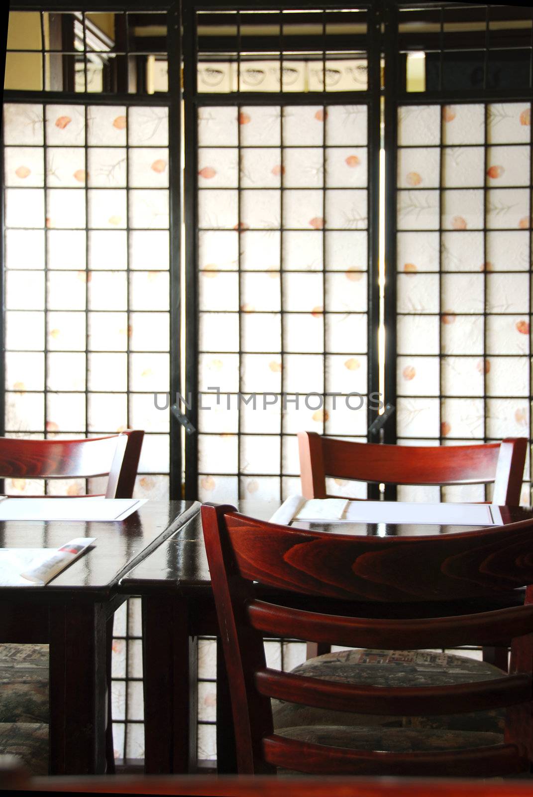 Interior of a modern japanese restaurant with rice paper screen