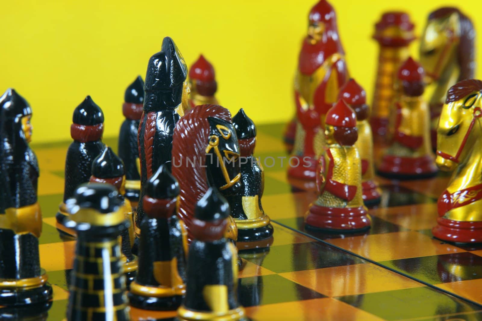 battle board games leisure concepts chess in yellow