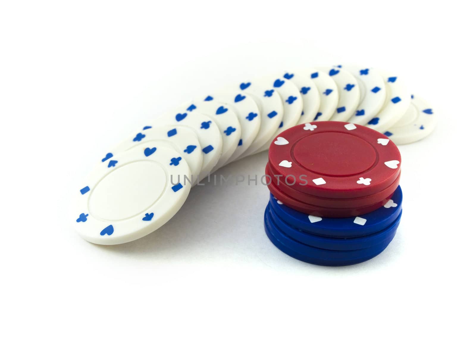 Red White and Blue Poker Chips on White Background by bobbigmac