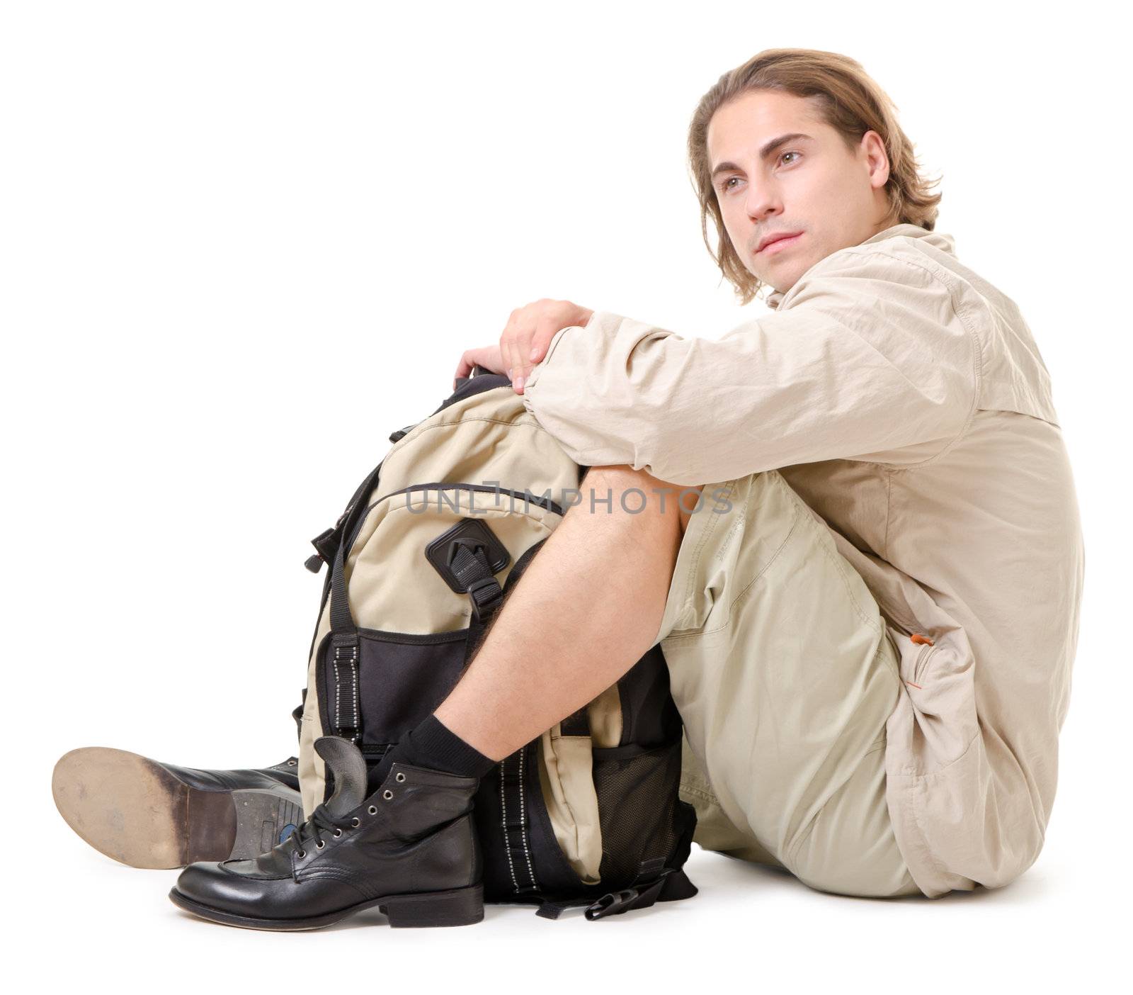 young man - tourist with backpack on a white background