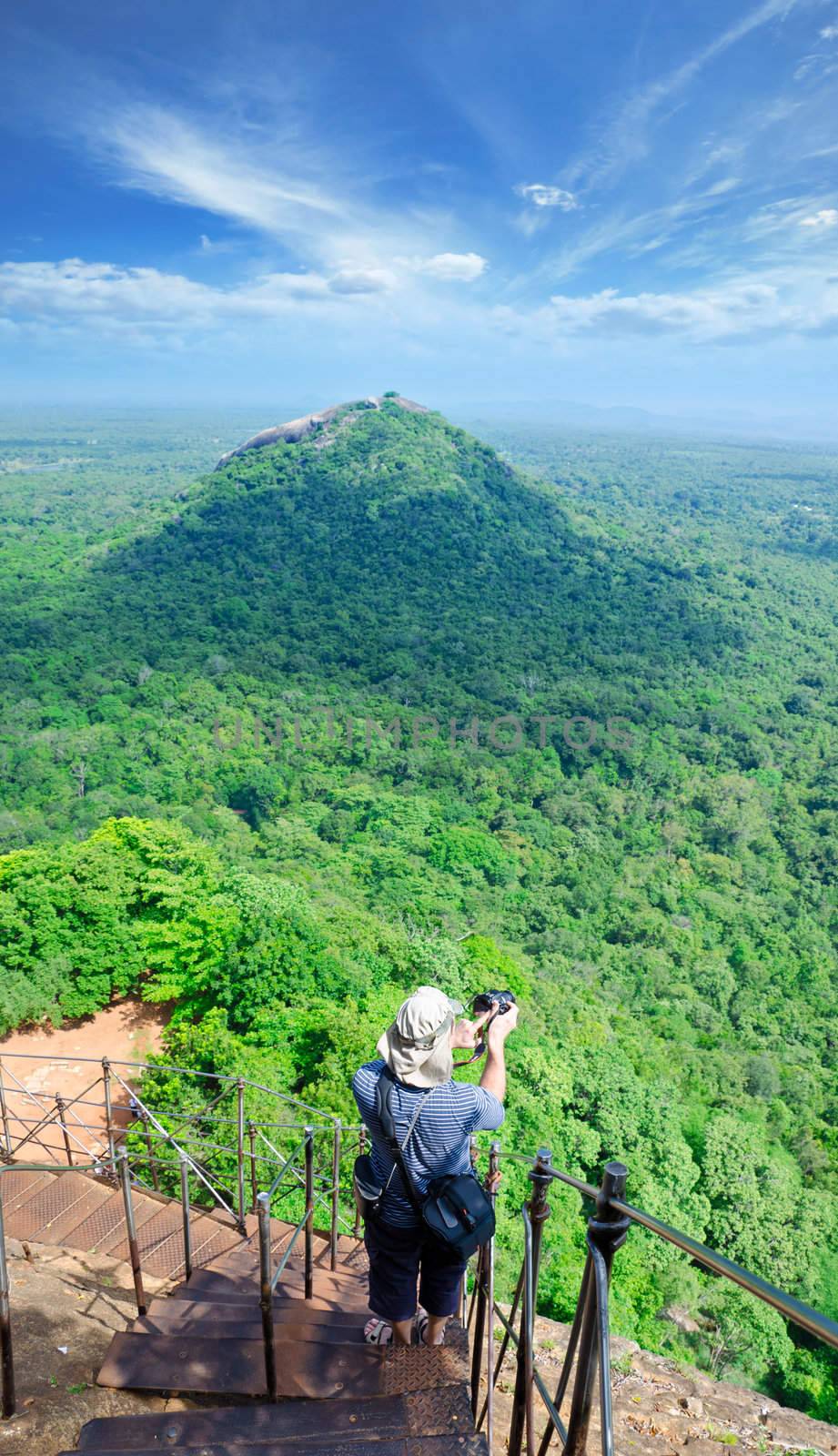 View from mount Sigiriya, Sri Lanka (Ceylon) with tourist on sho by Sergieiev