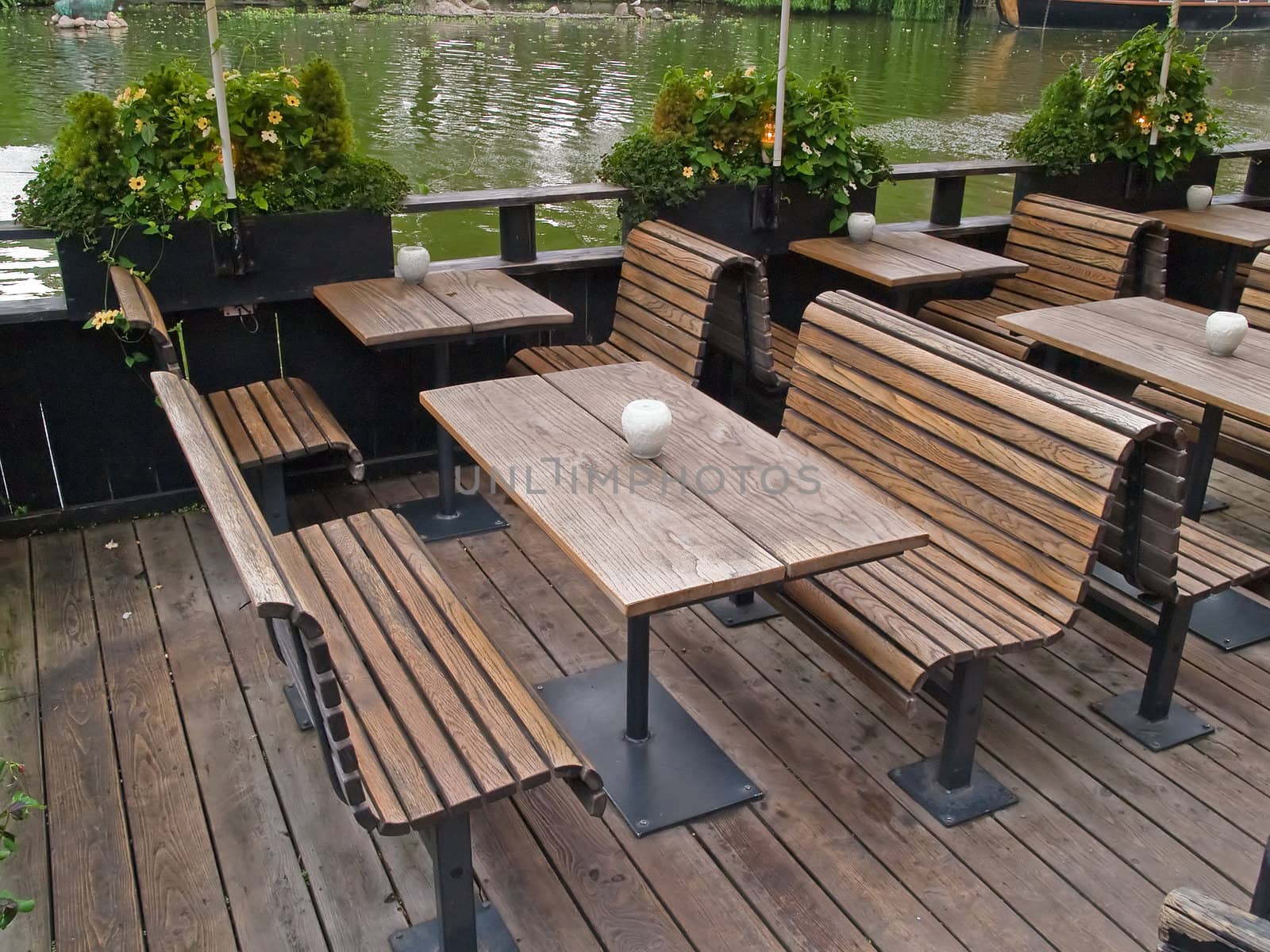 Outdoor restaurant cafe by a lake Tivoli Gardens Copenhagen Denmark
