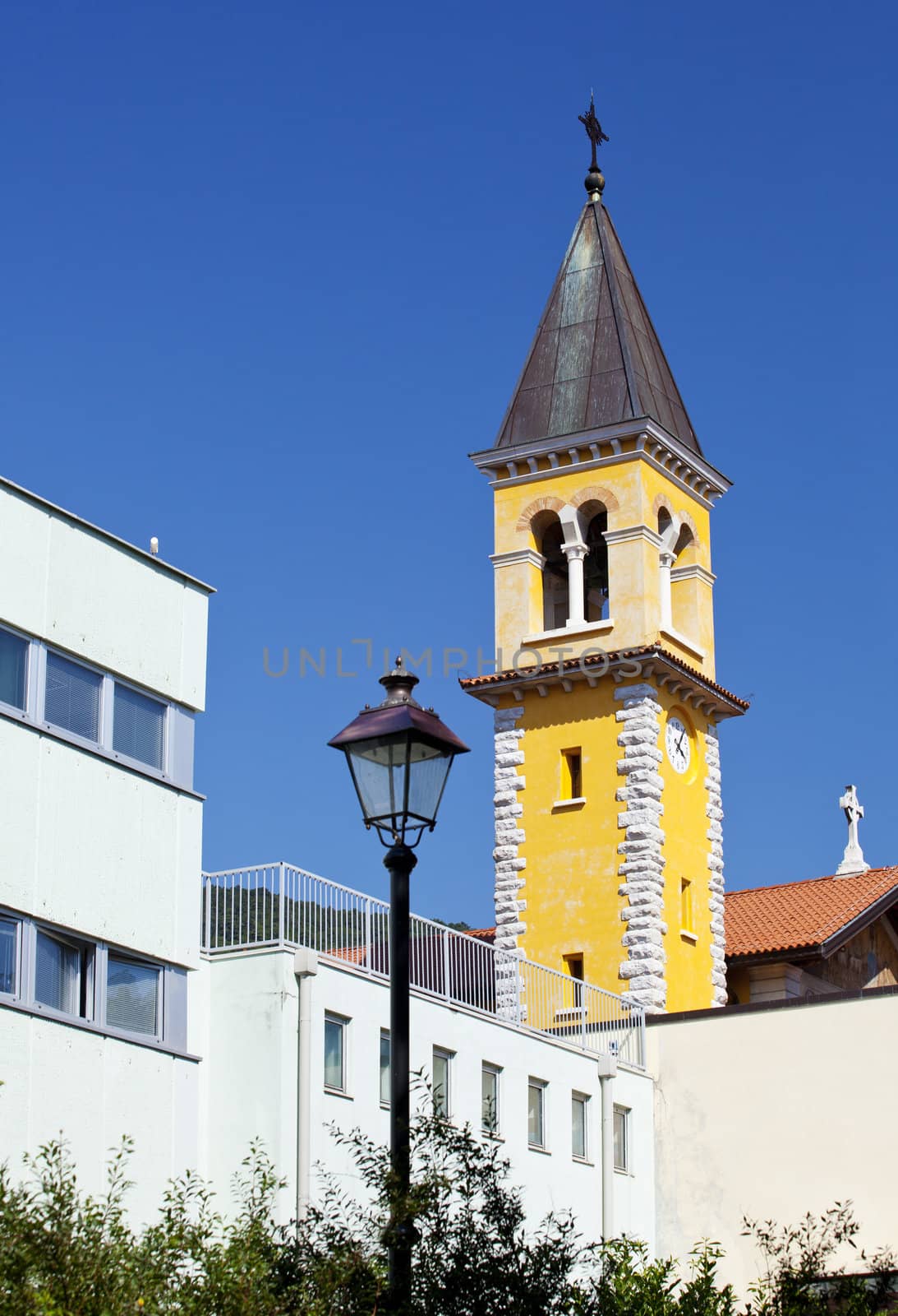 Bell tower of a church, St. Giovanni park- Trieste, Italy