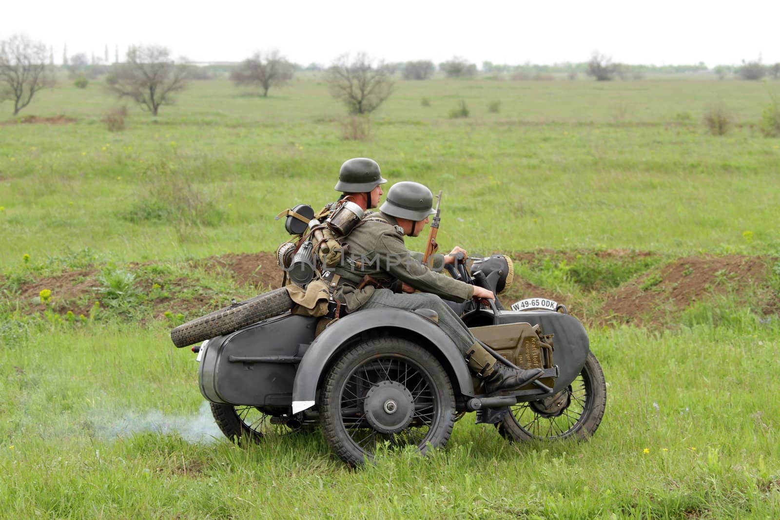 Odessa ,UKRAINE. May 8, 2011. German soldiers of WW2 at the combat. Military history club. Historical military reenacting. Demonstration for public historical reconstrucrion of one of combats between Soviet and German armies. German uniform WW2