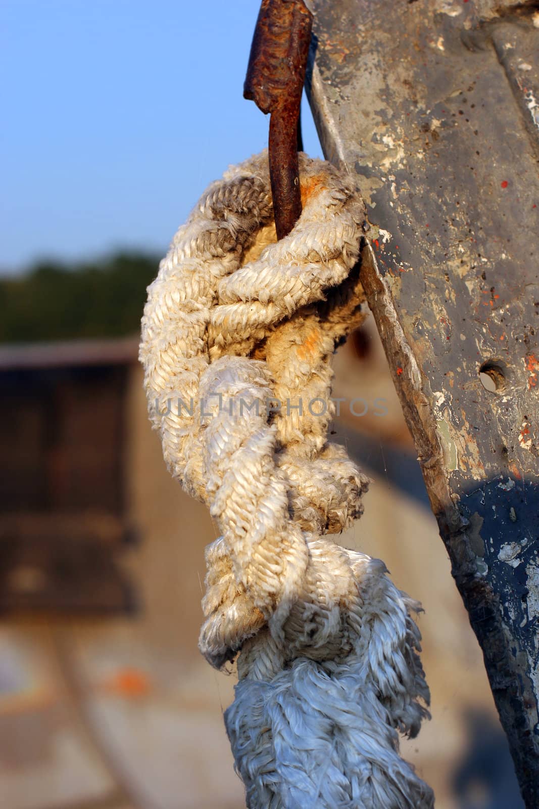 bend of old rope of the bow of the old boat (marine knot). Close up