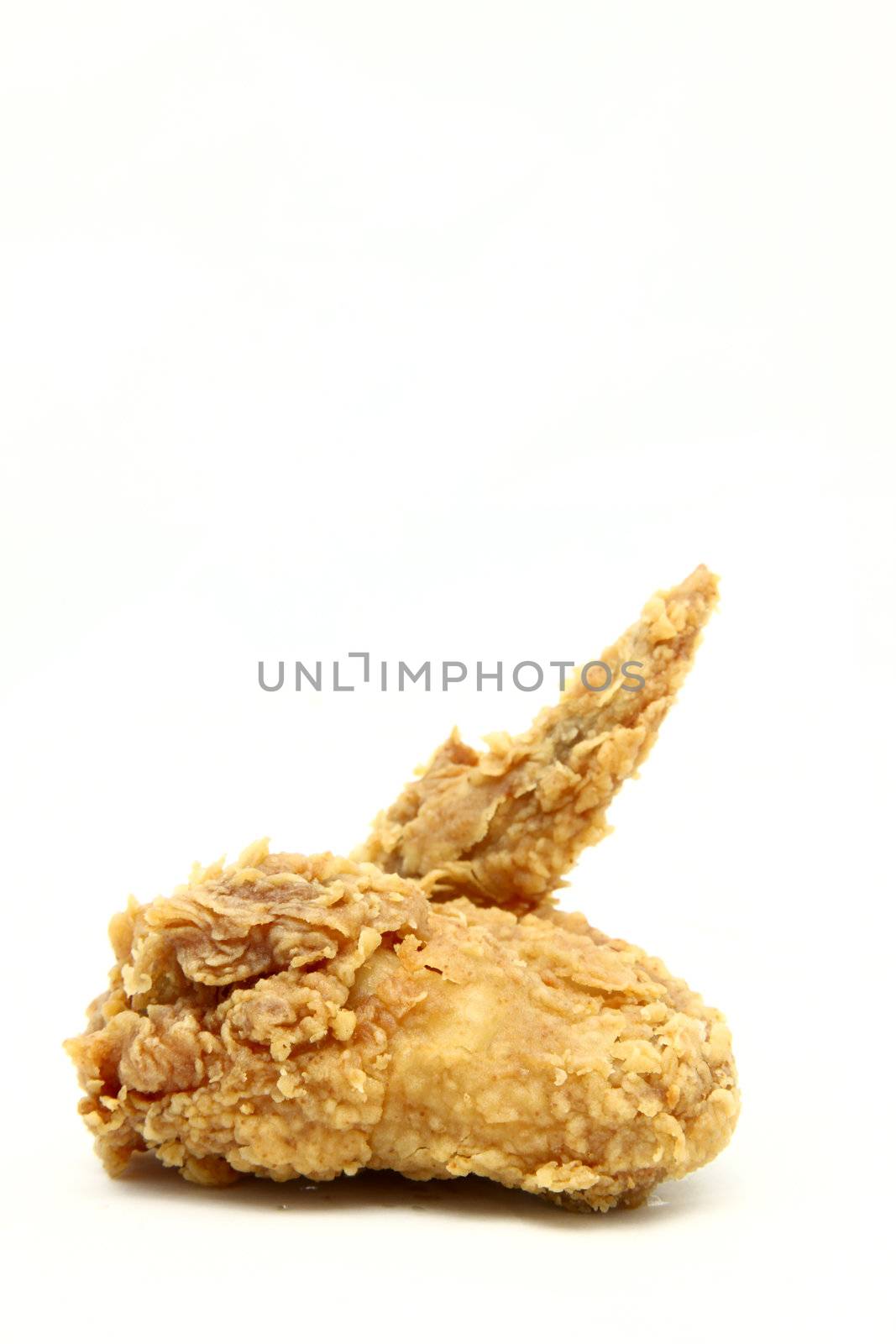 isolated deep fried chicken wing