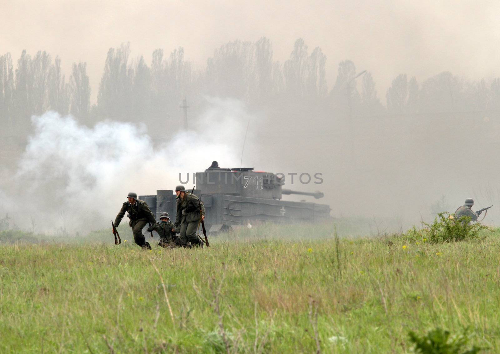 Odessa ,UKRAINE. May 8, 2011. German soldiers of WW2 at the combat. Military history club. Historical military reenacting. Demonstration for public historical reconstrucrion of one of combats between Soviet and German armies. German uniform WW2