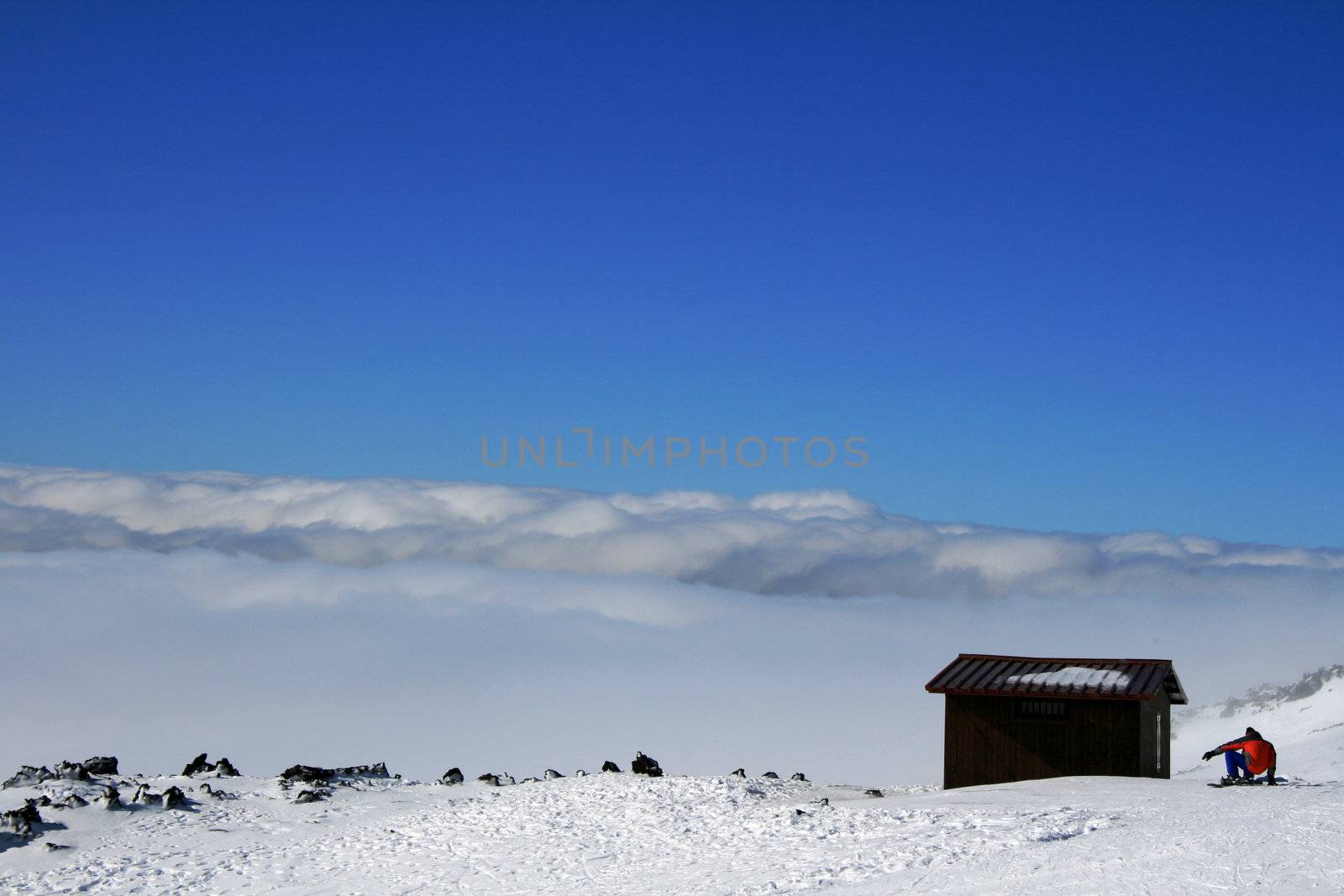Wooden house on Etna Volcan covered by snow - Italy