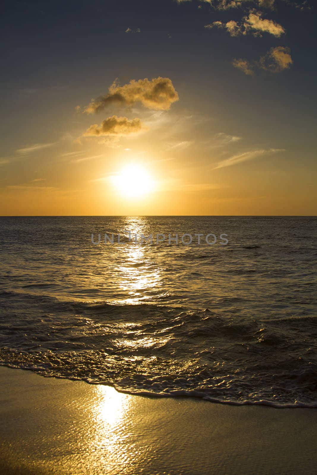 Sunset over a calm pacific ocean