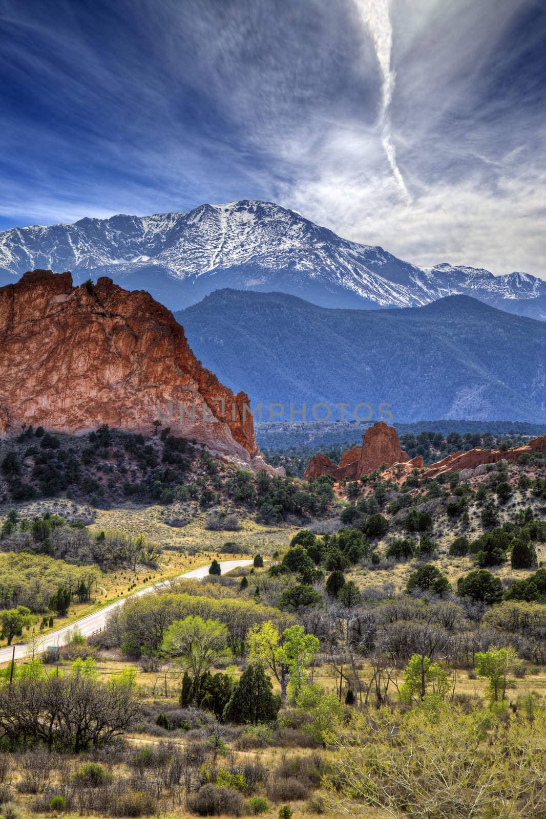 A High Dynamic Range photo of the Garden of the Gods park in Colorado Springs, Colorado with Pikes peak in the background. 