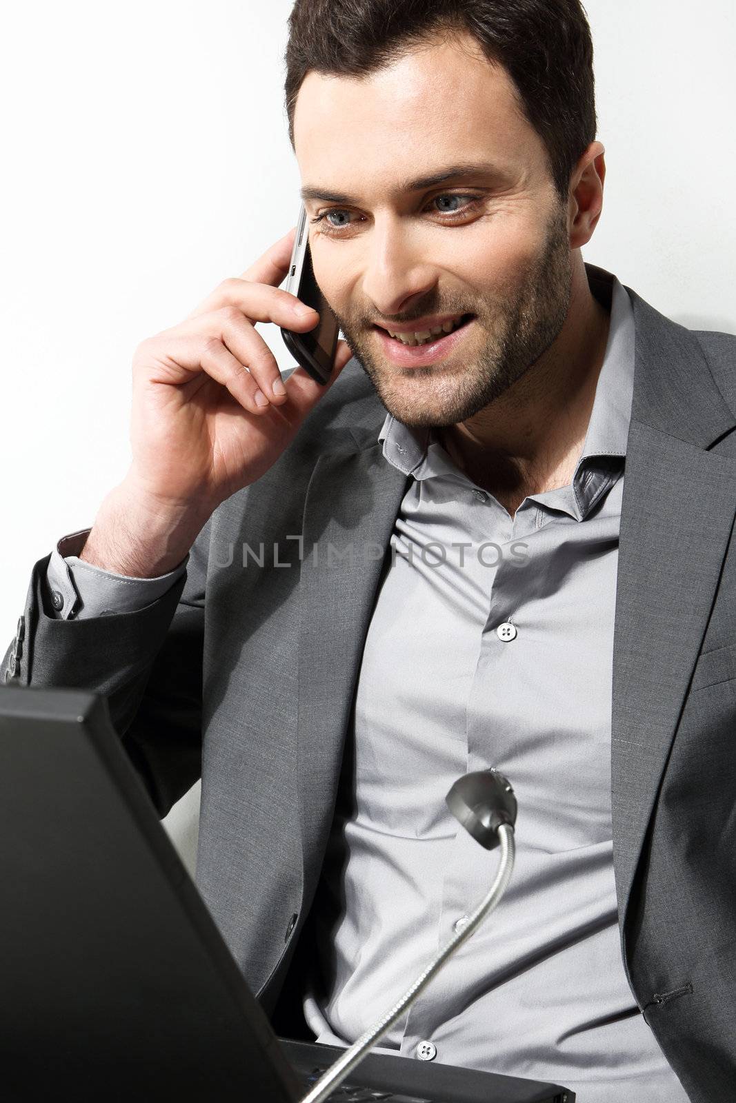 Young businessman working on is laptop