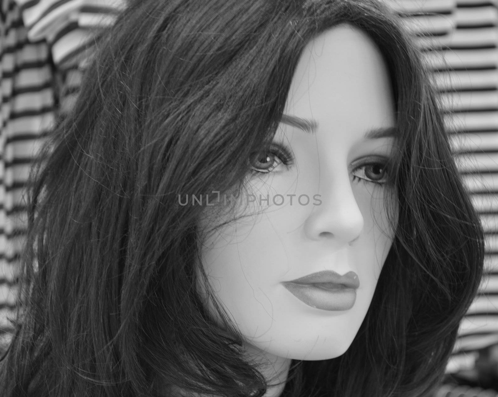 Monochrome close up orf mannequins head with long hair