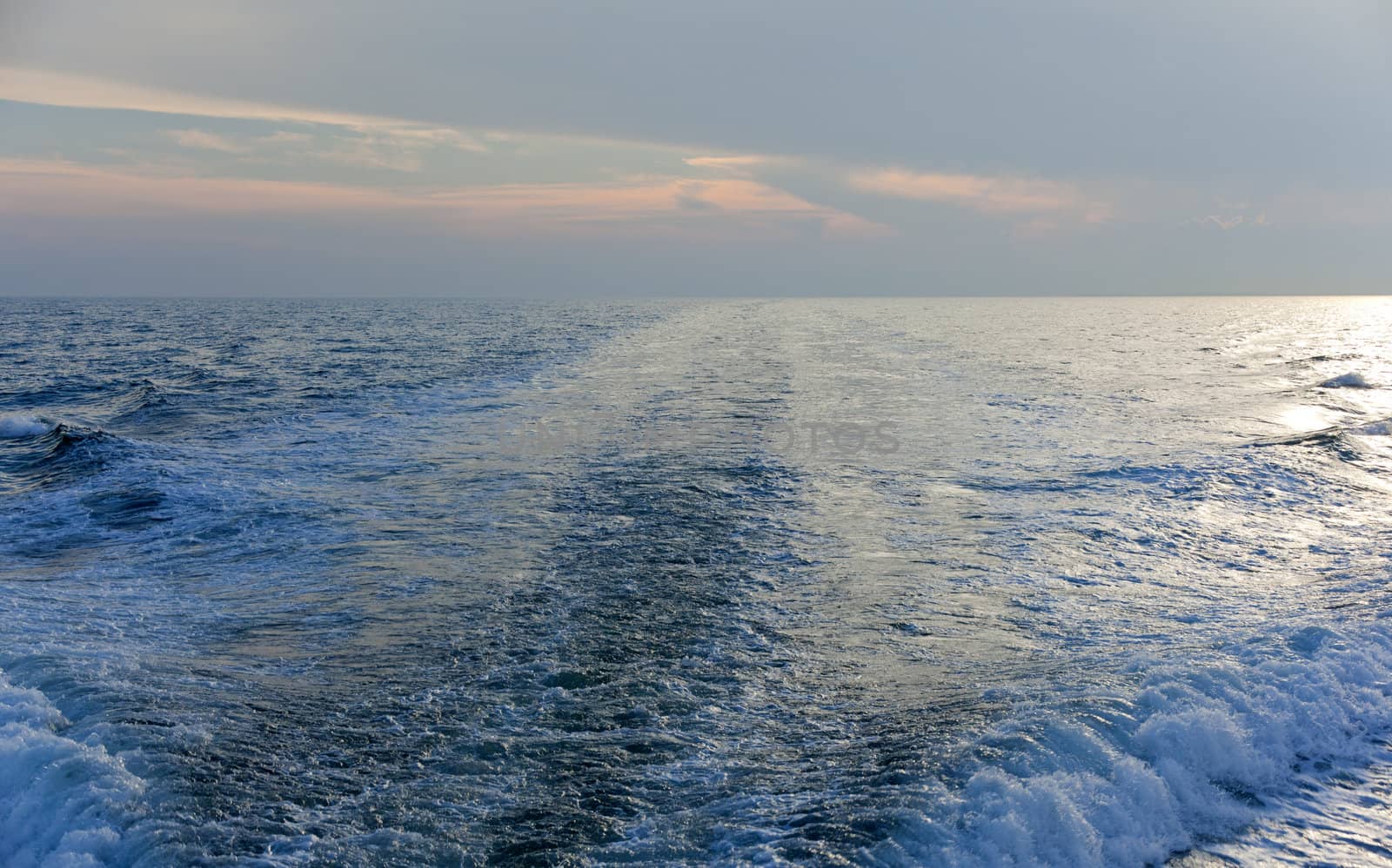 Wawe on the sea at sunset
