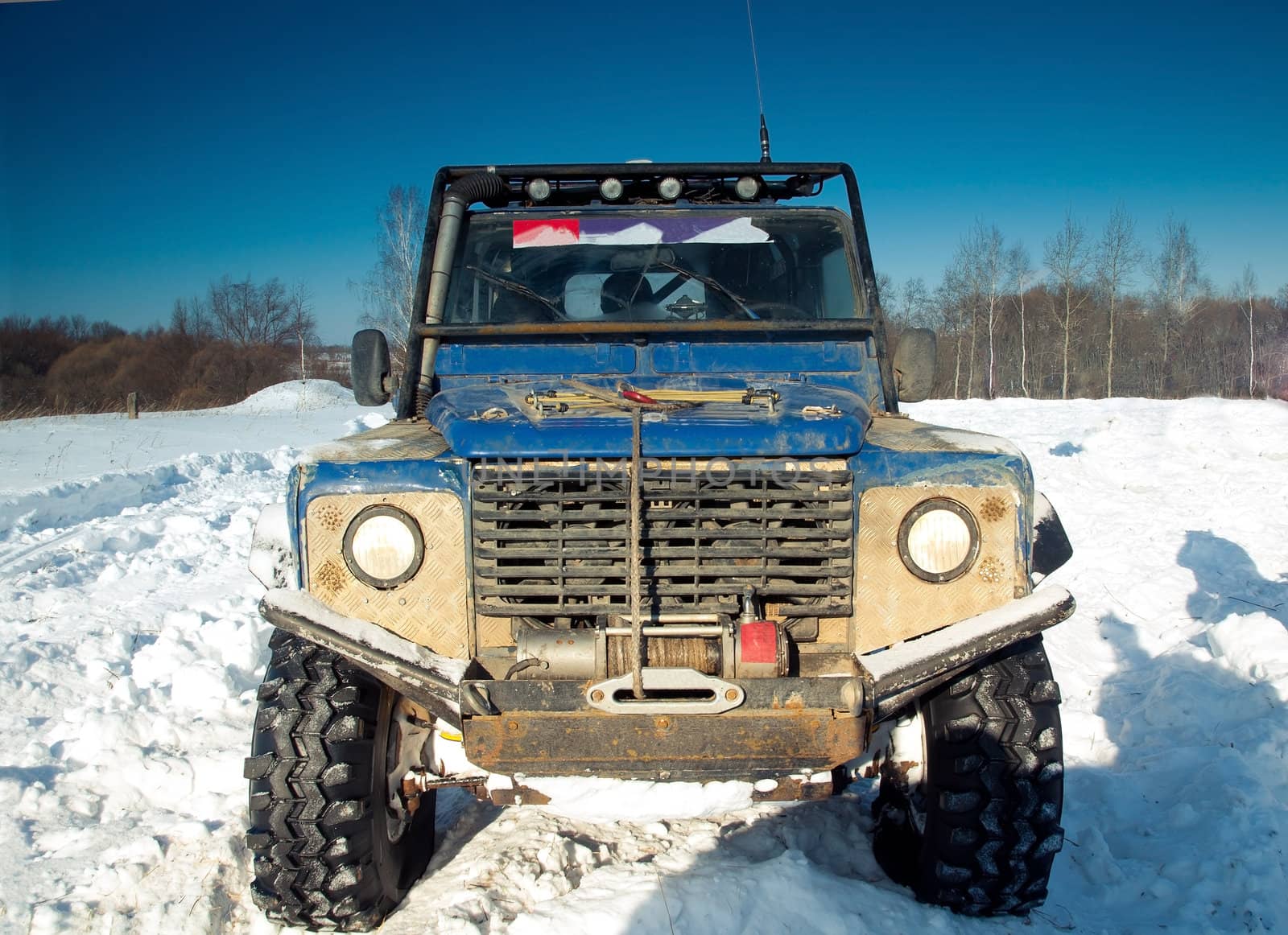 Land Rover Defender 90 suv.
Car on background the Russian winter.