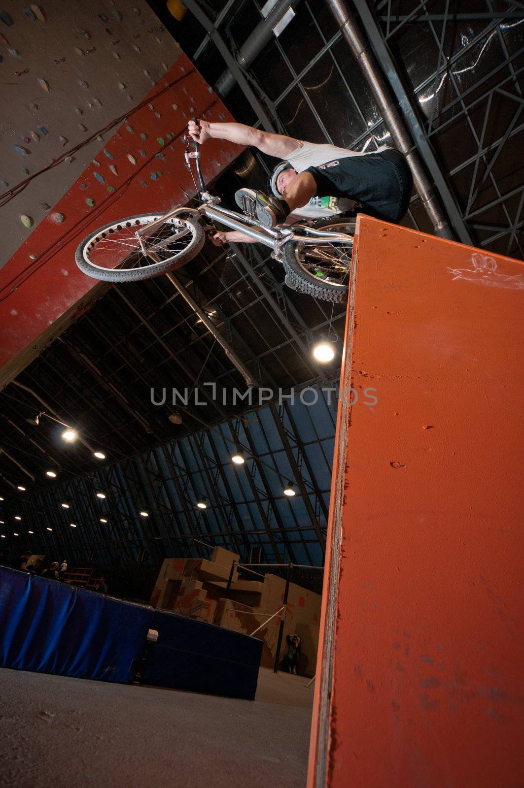 Cyclist dropping from grain in park by dmitryelagin