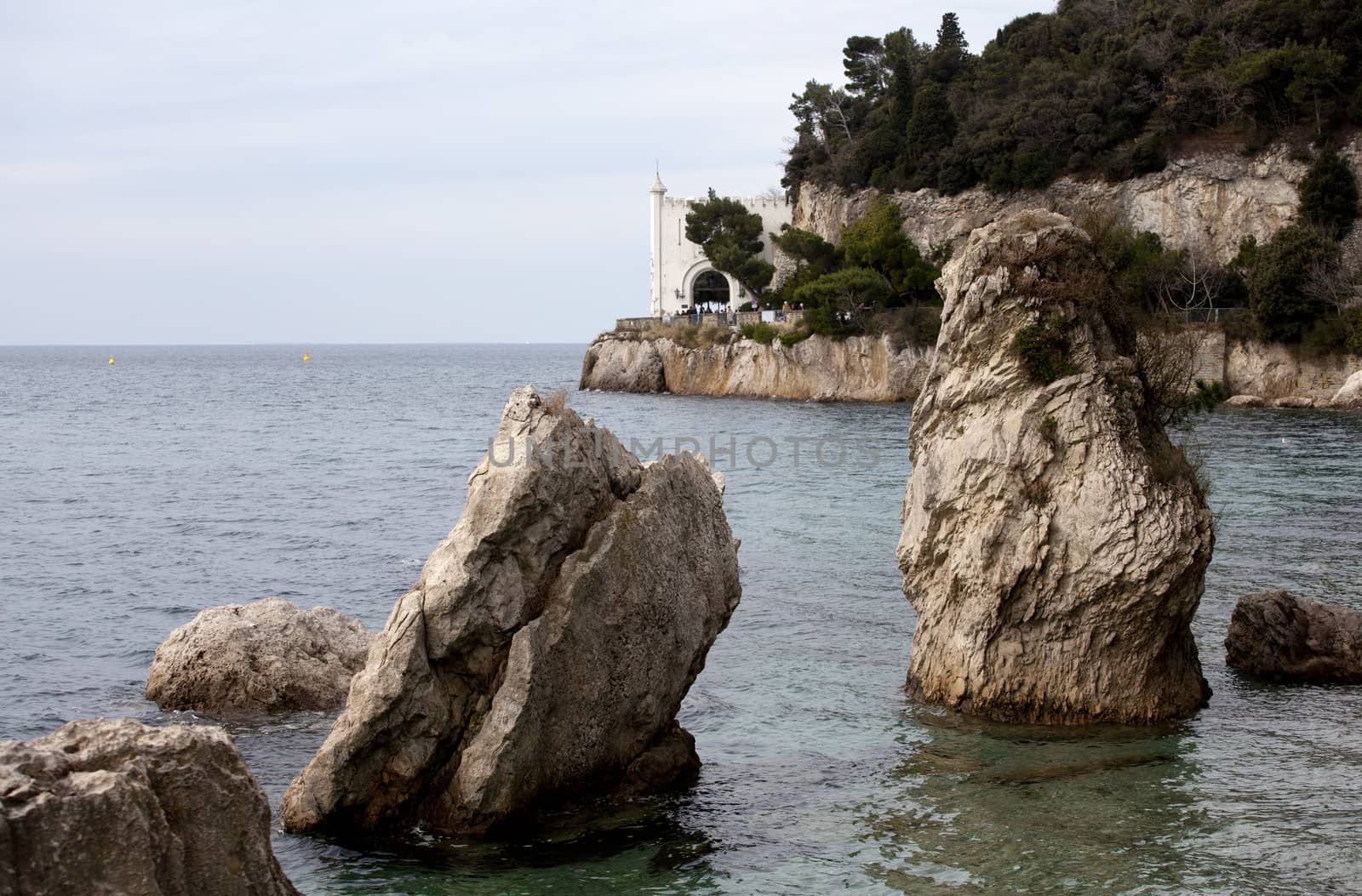 Rock on the sea, Miramare castle. Trieste - Italy