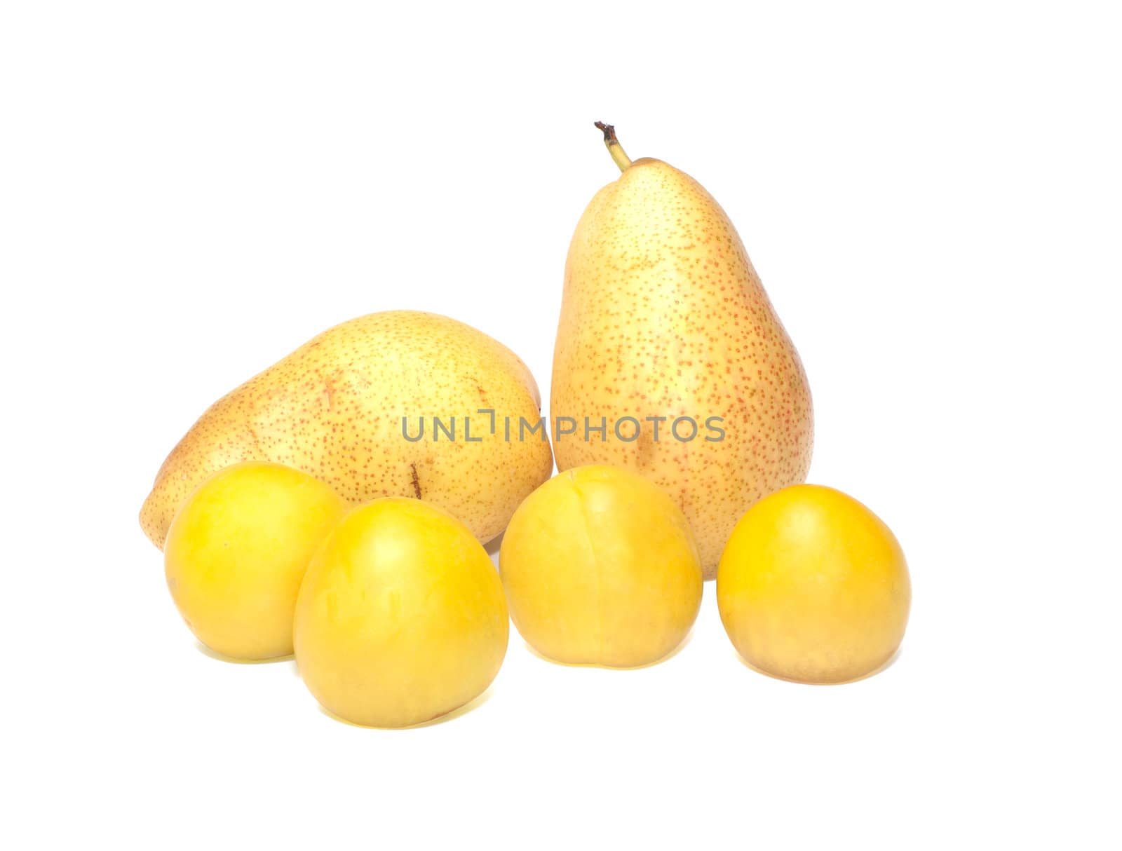 Yellow plums and pears it is isolated on a white background.