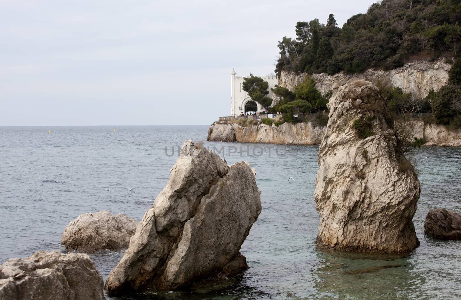 Rock on the sea, Miramare castle. Trieste - Italy