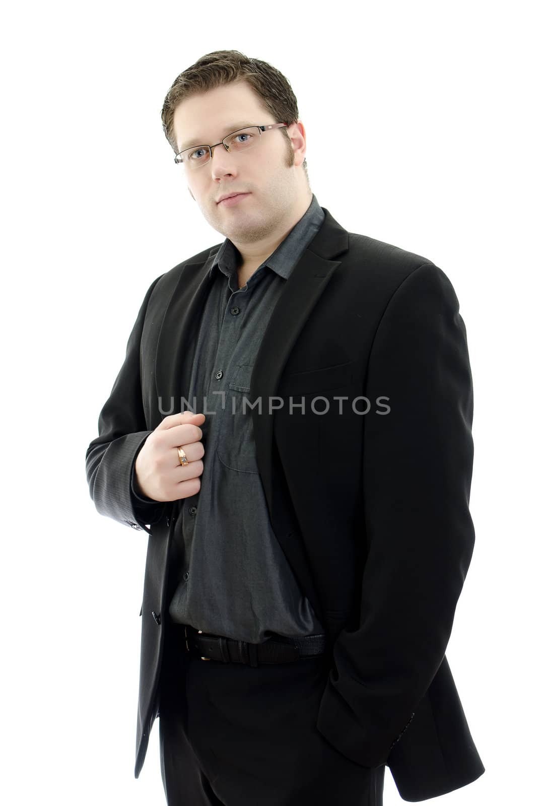 Portrait of a handsome young business man in glasses. Isolated on white background with copy space.