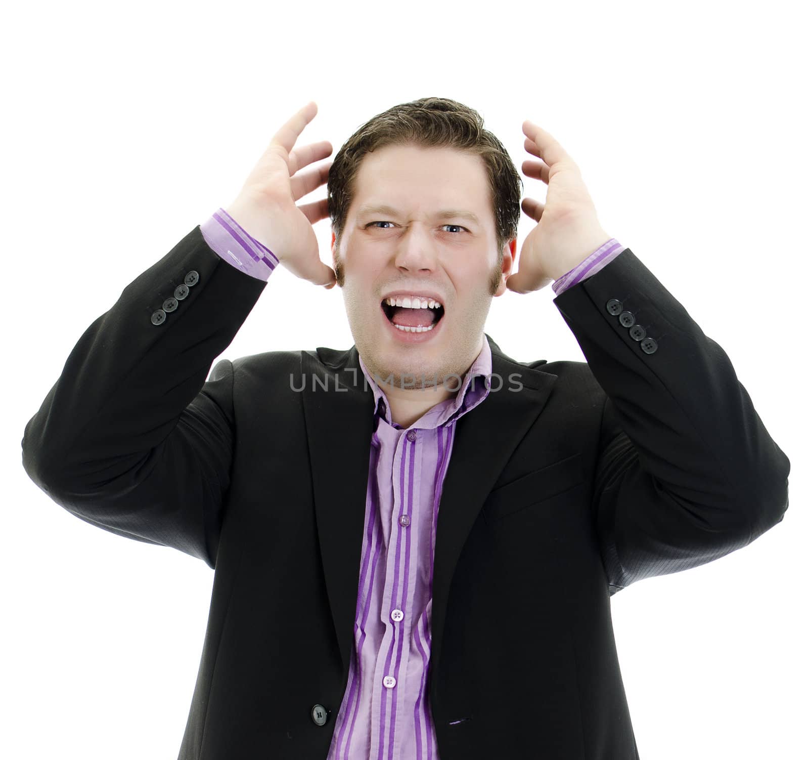 Portrait of a young Angry business man. Isolated over white background