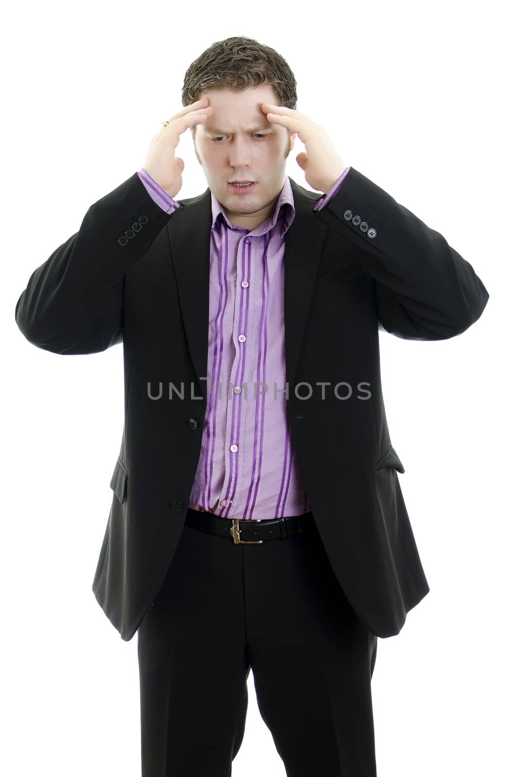 Portrait of a young business man looking depressed from work. Isolated over white background