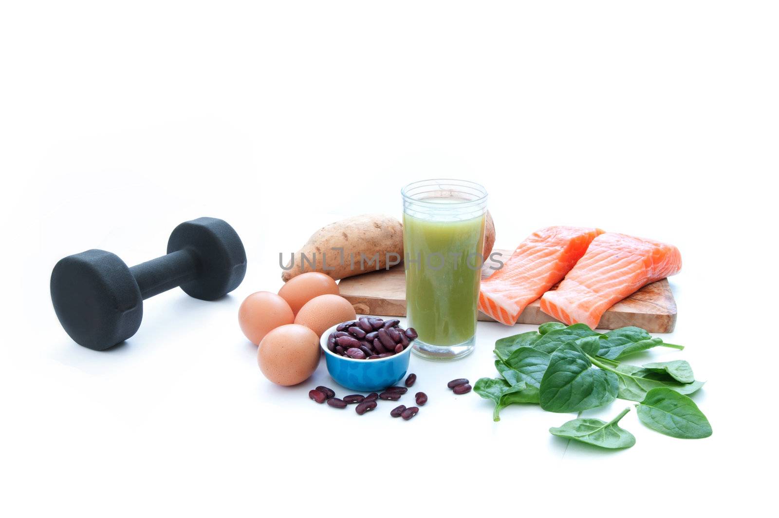 Protein rich foods including eggs, spinach leaves and kidney beans with a healthy beverage
