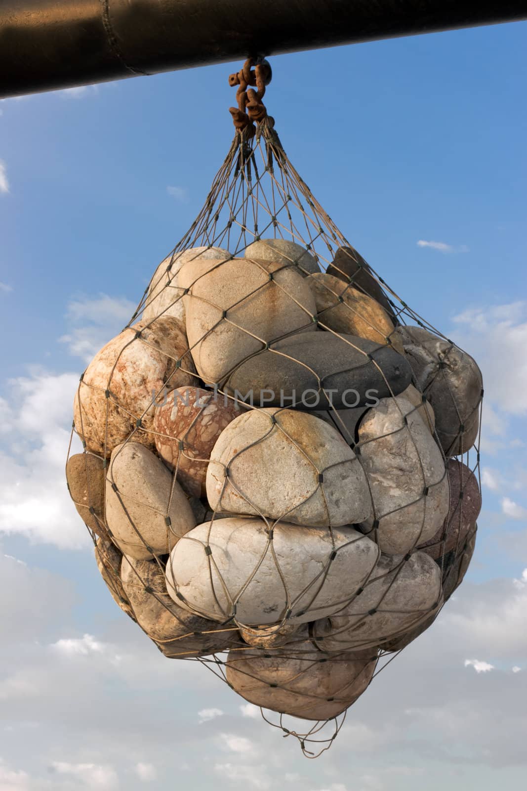 stone in net on background sky