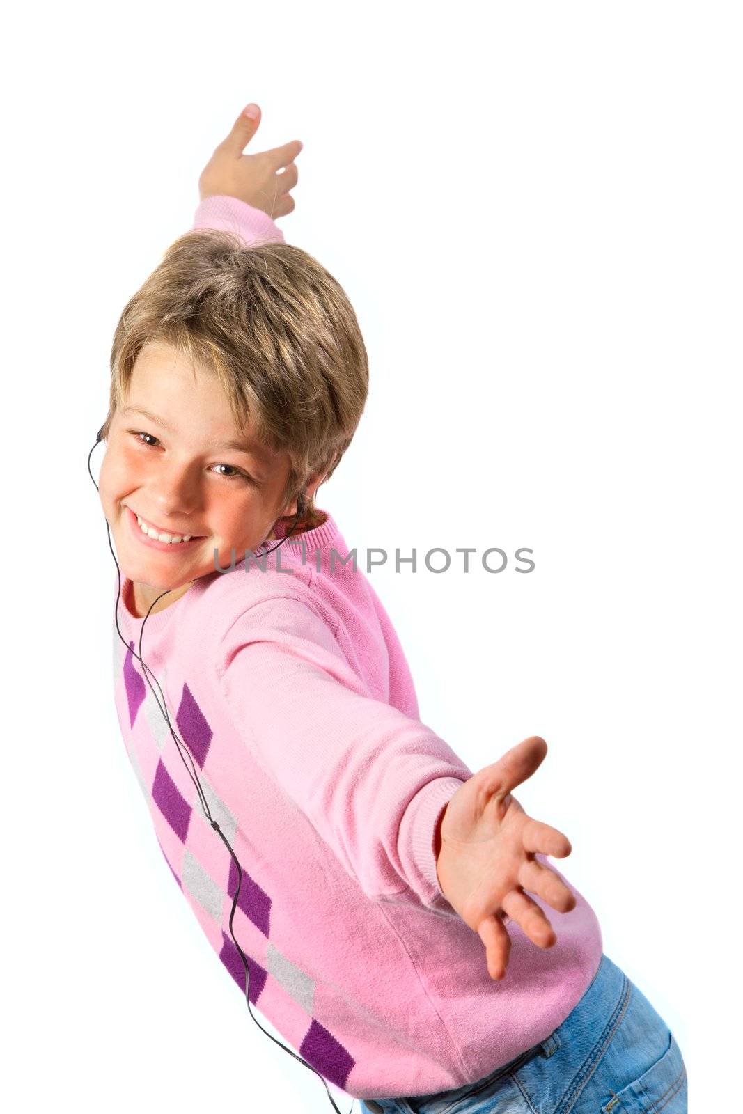 Happy boy with earphones dancing with open arms on isolated  white background