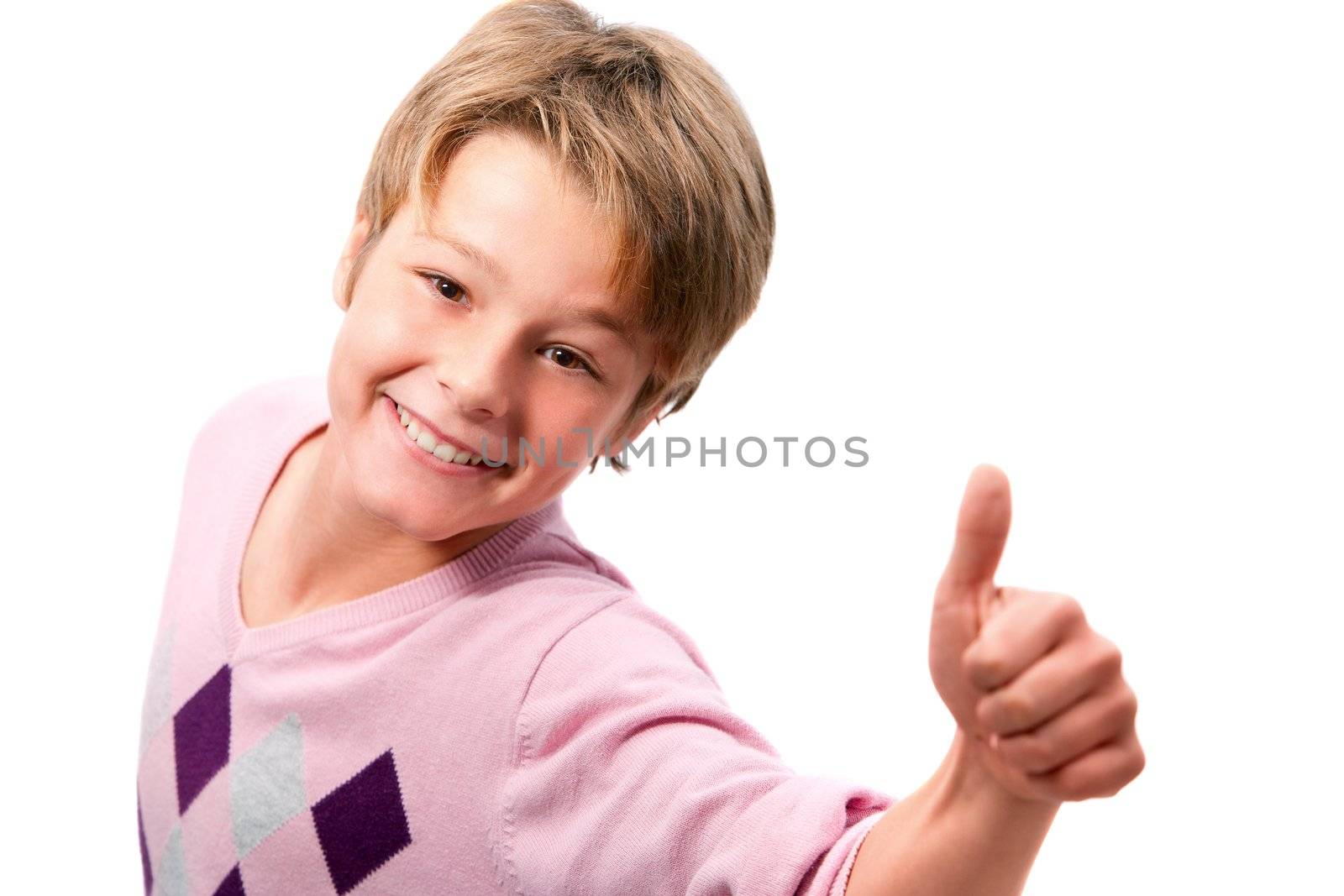 Portrait of young boy showing thumbs up by karelnoppe