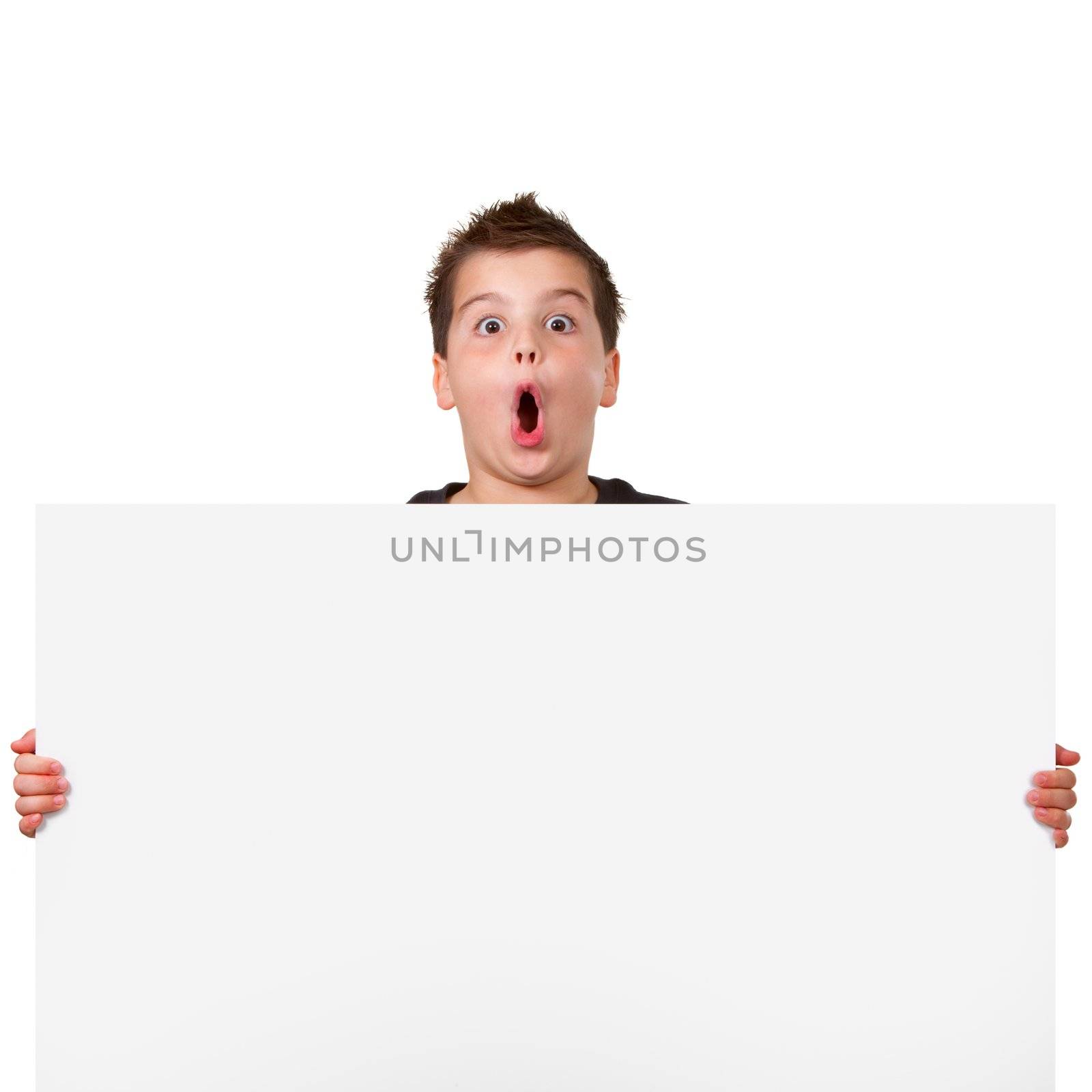 Teen boy with funny face expressions holding white board with copyspace. Isolated on white. 
