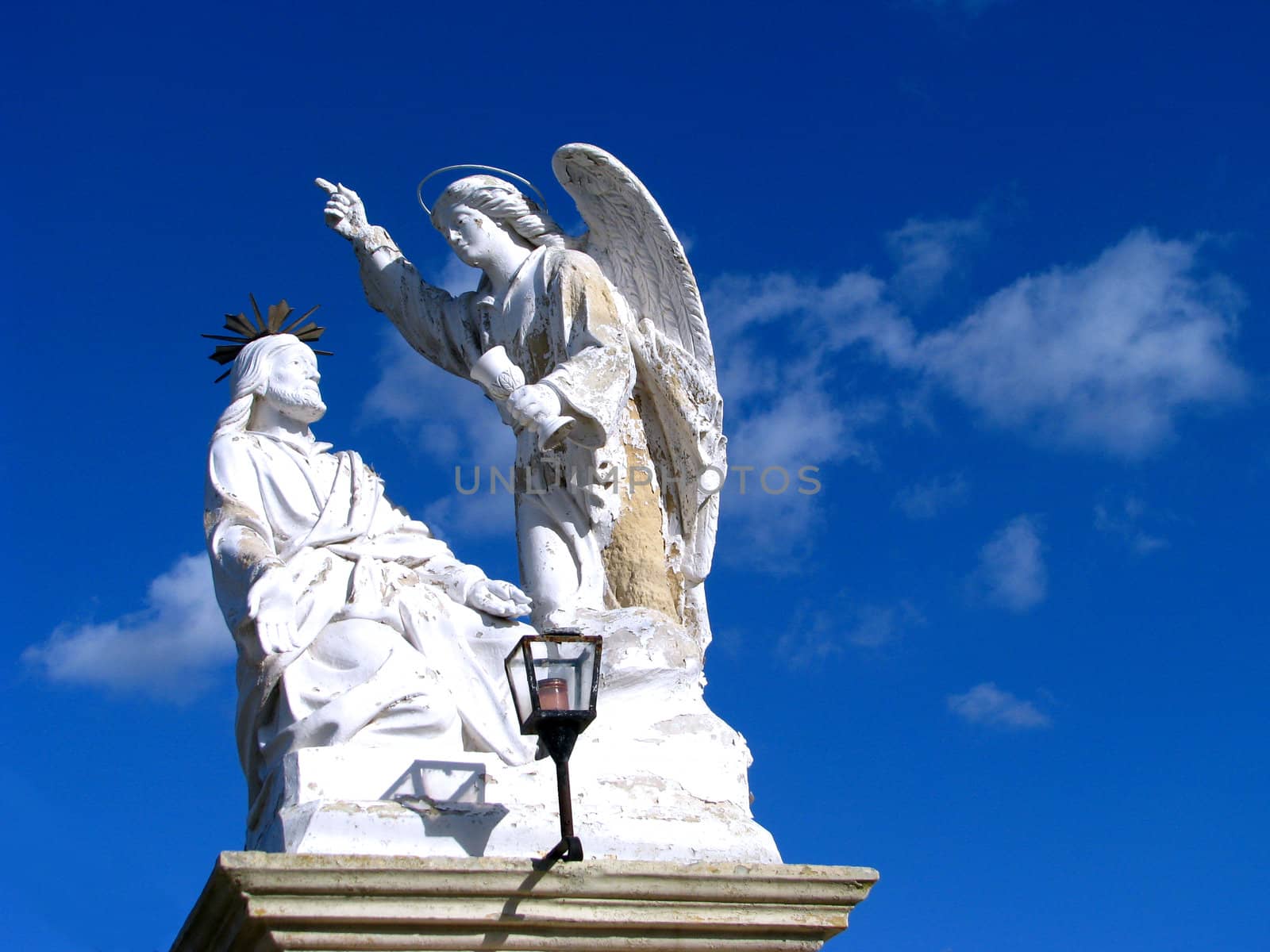 A statue of Jesus praying in the Garden of Gethsemani at the foot of the hill that leads to Laferla's Cross in Siggiewi, Malta.