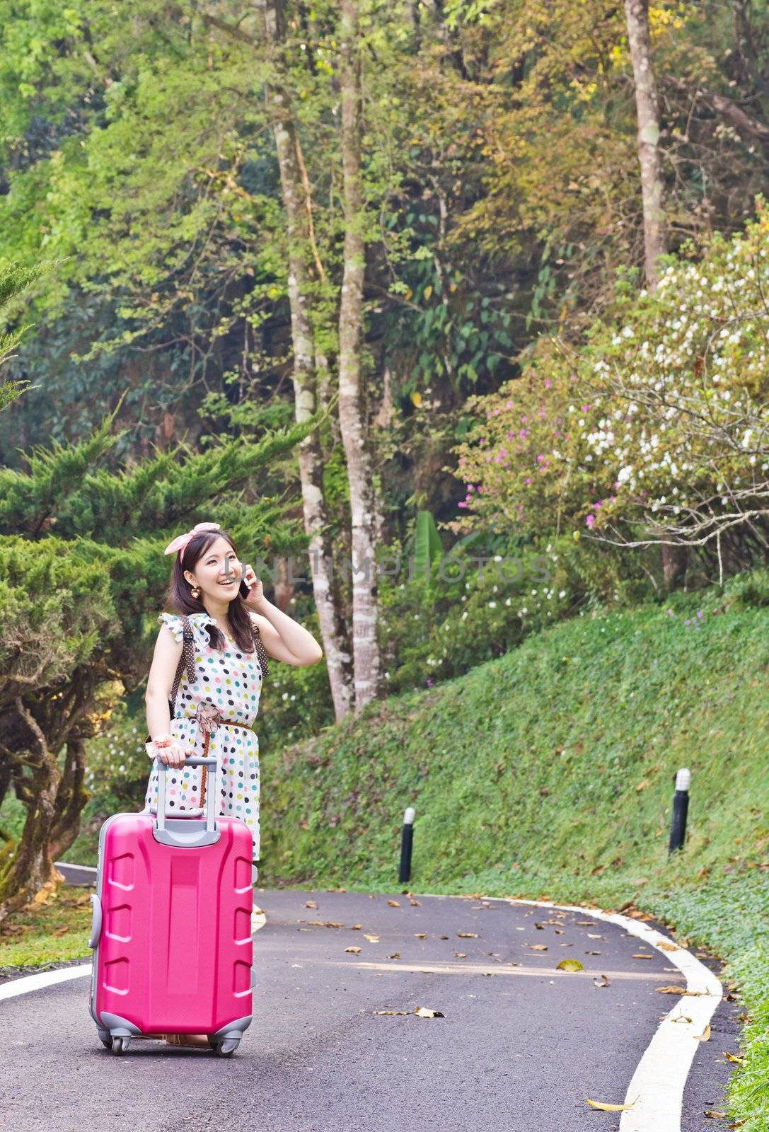 Asian woman talking on the phone